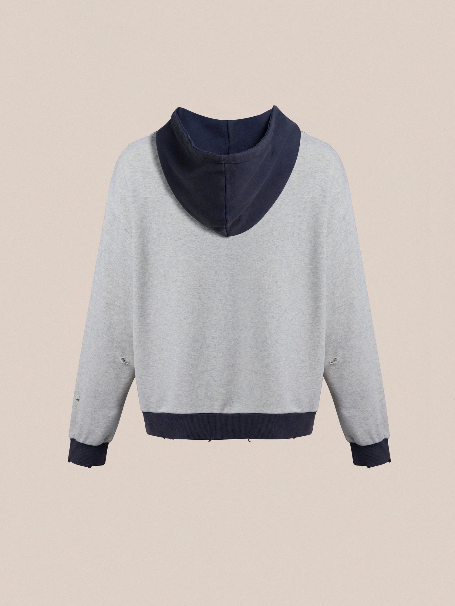 The back view of a Found two tone hoodie made from enzyme-washed cotton in grey and navy.