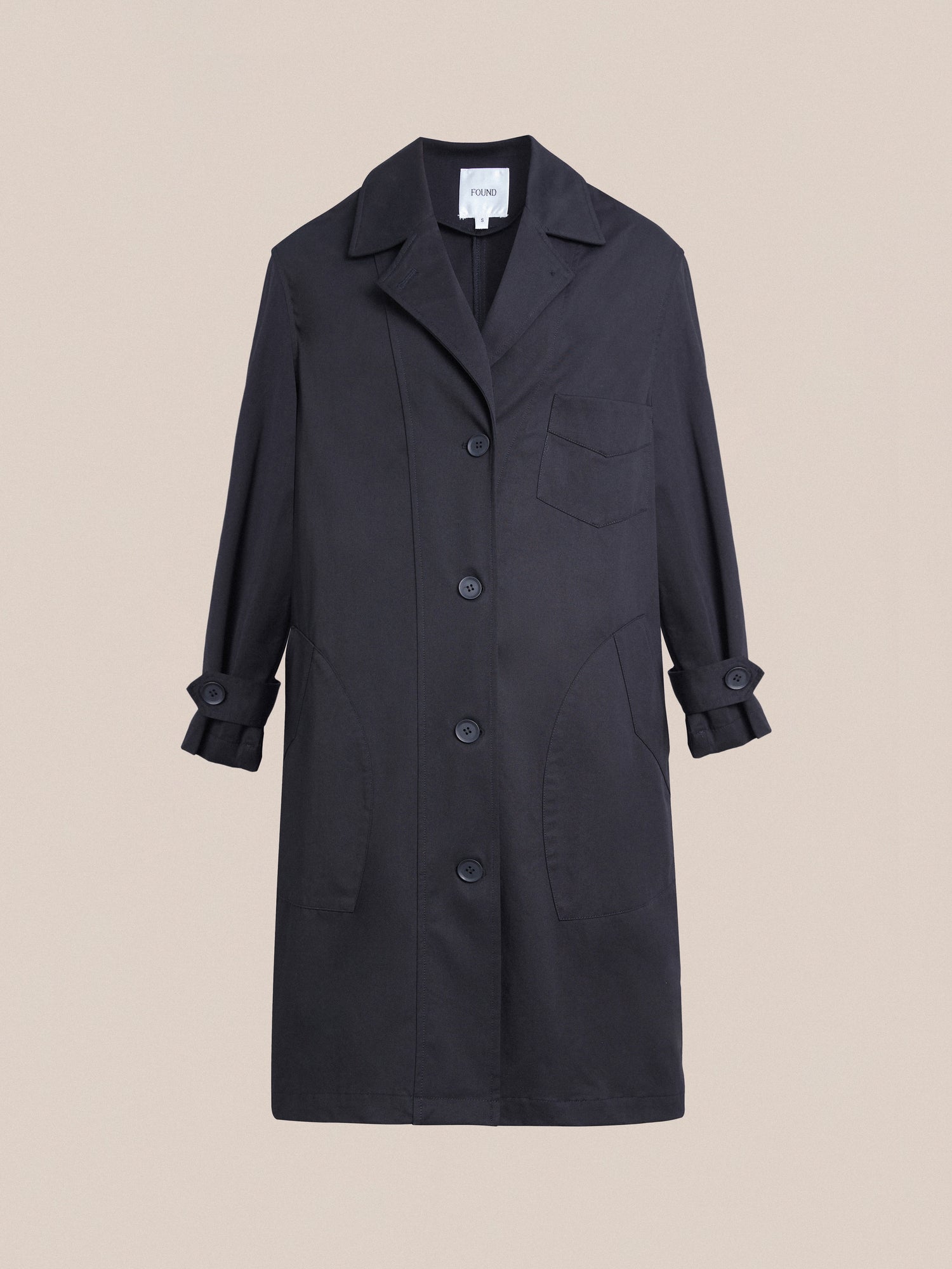 A black Found Naval Trench Coat with buttons and pockets, crafted from premium materials.
