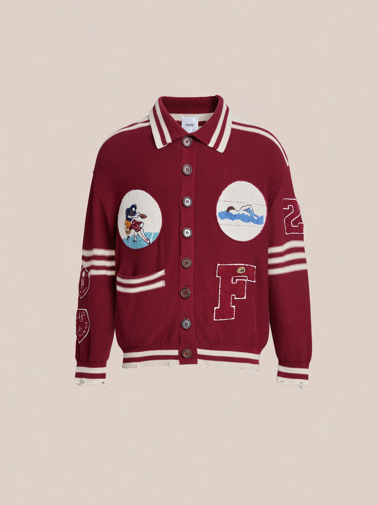 A Fin Varsity Patch Collared Cardigan with embroidered chenille patches by Found.