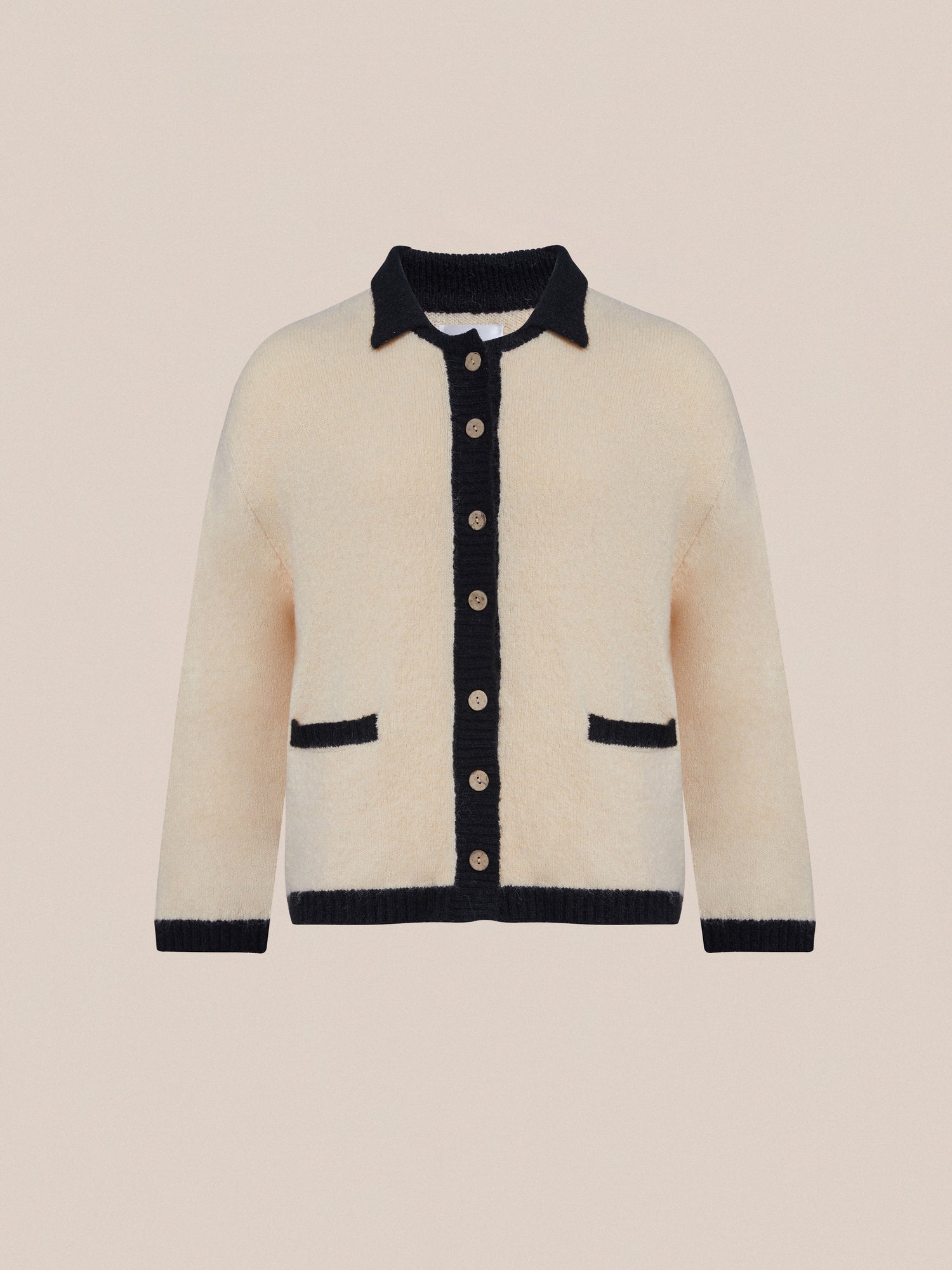 A cream Found Sima Contrast Collar Knitted Cardigan with wooden buttons.