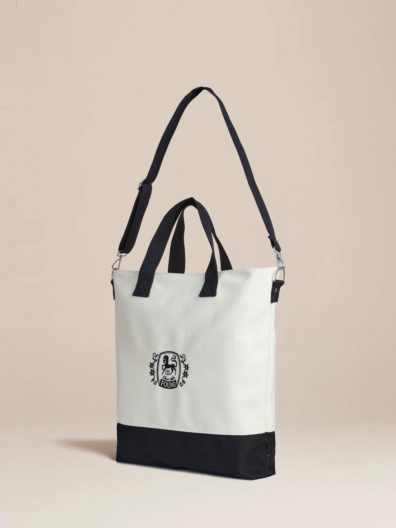 A black and white Horse Logo Crest Canvas Bag from Profound, made from premium cotton twill.