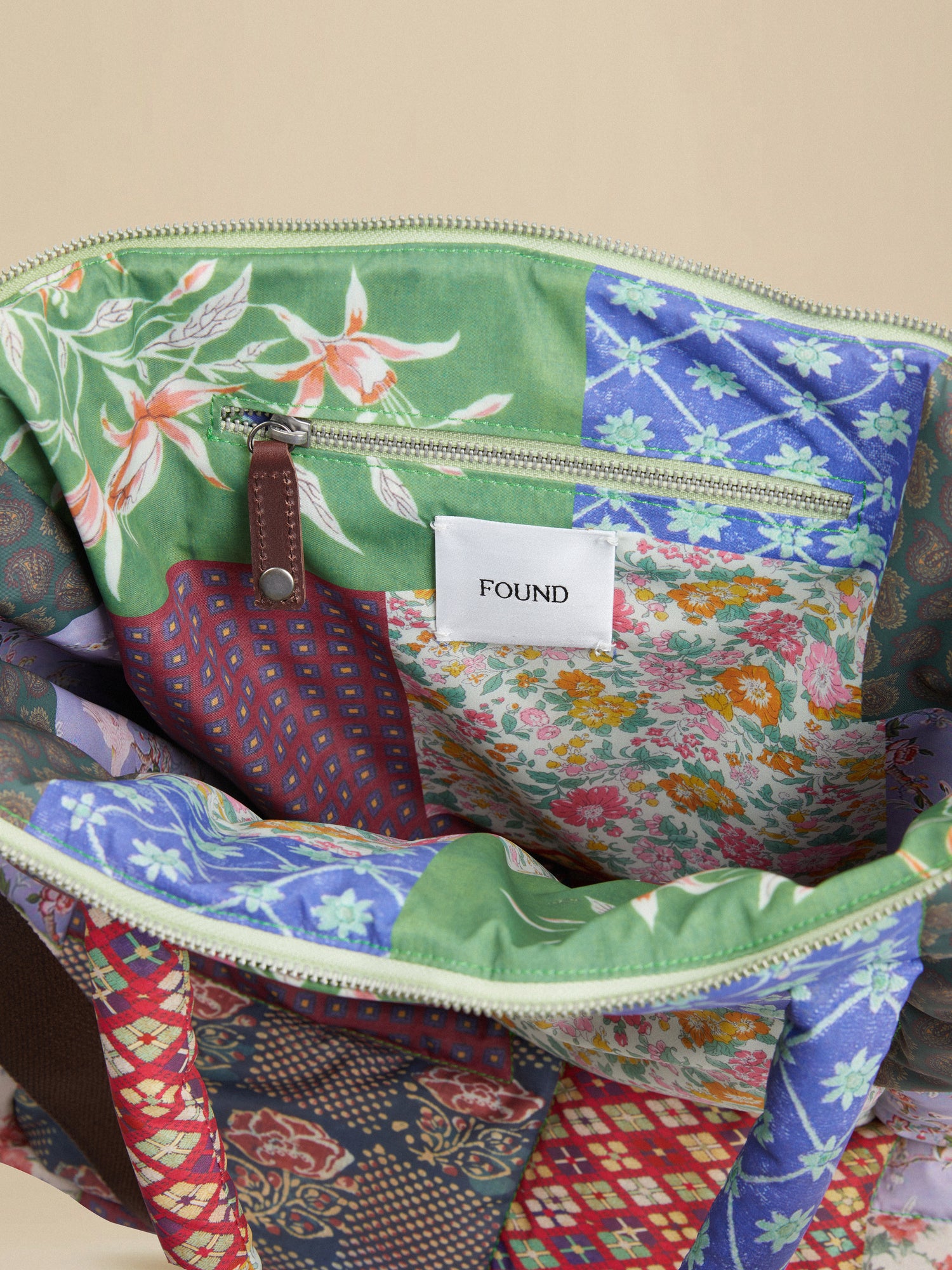 A colorful Gardenia Tapestry Bag with a South Asian prints patchwork pattern by Profound.
