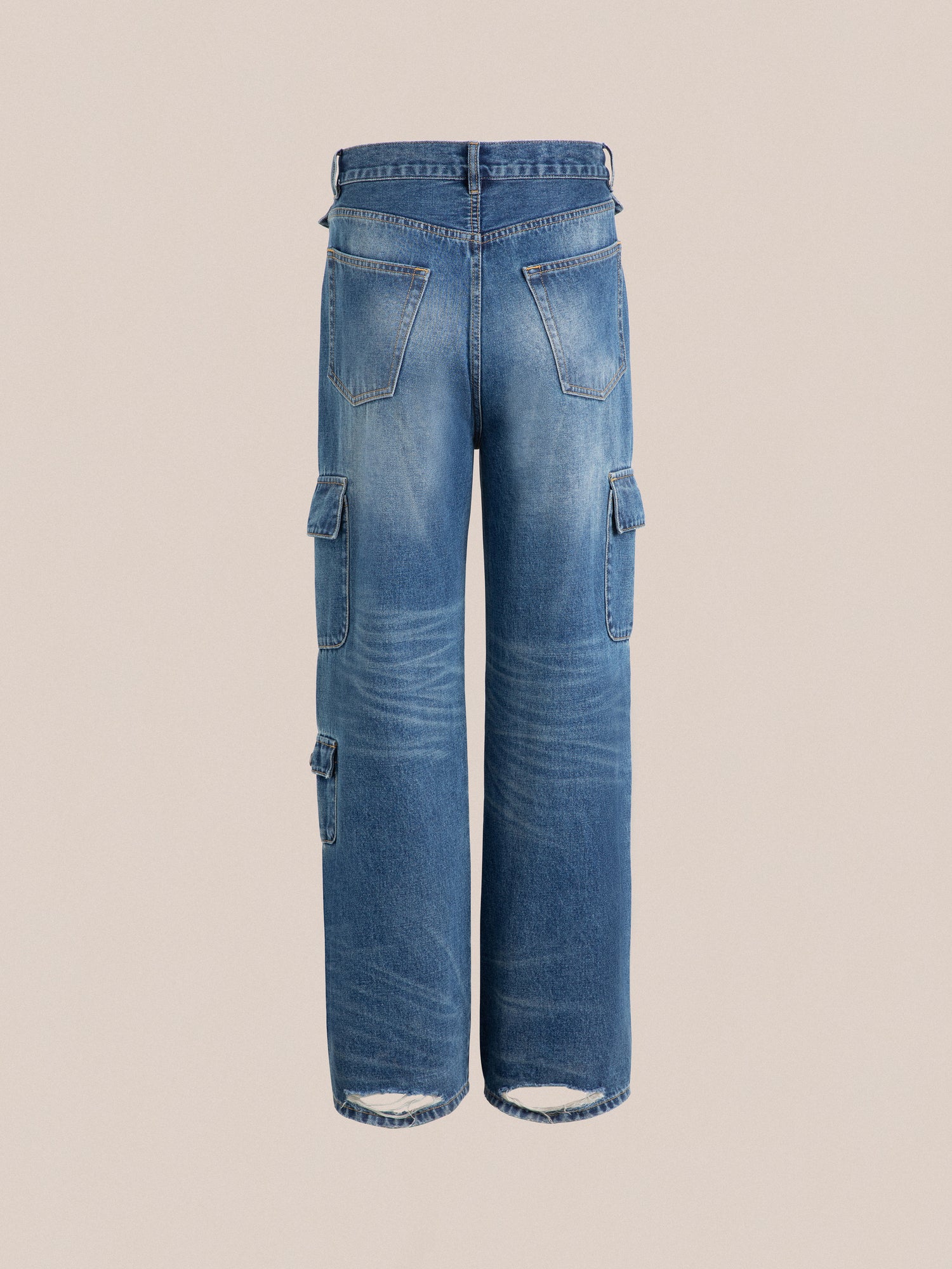 Siwa Cargo Paneled Jeans from Found, with side pockets and distressed hems, displayed against a neutral background.