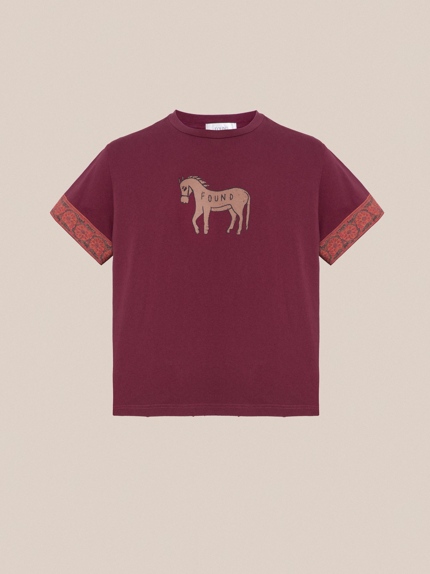 A burgundy Horse Embellishment Tee with a horse and floral motifs embellishment on it by Found.