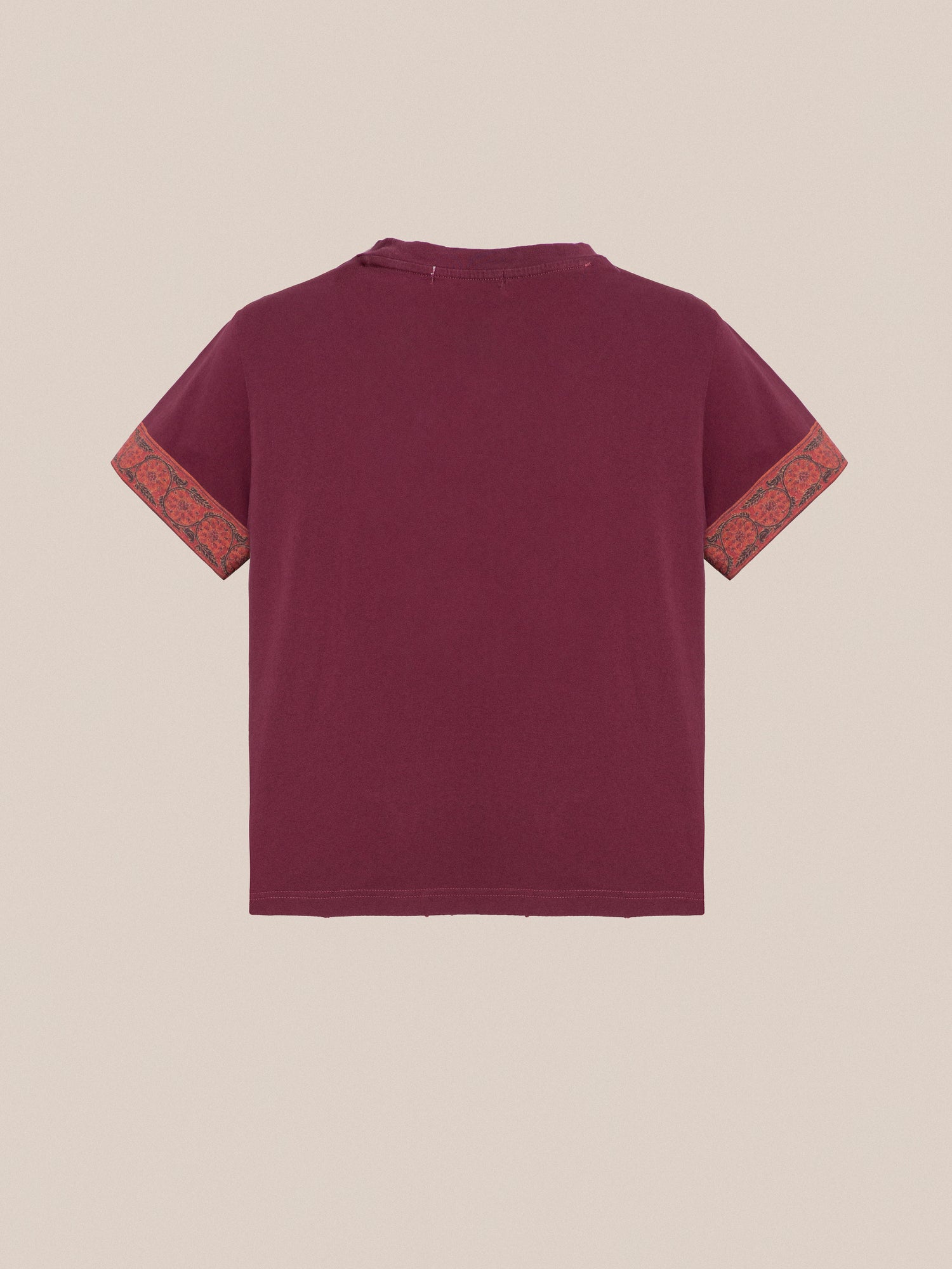 A burgundy Horse Embellishment Tee with an orange trim and floral motifs embellishment by Found.