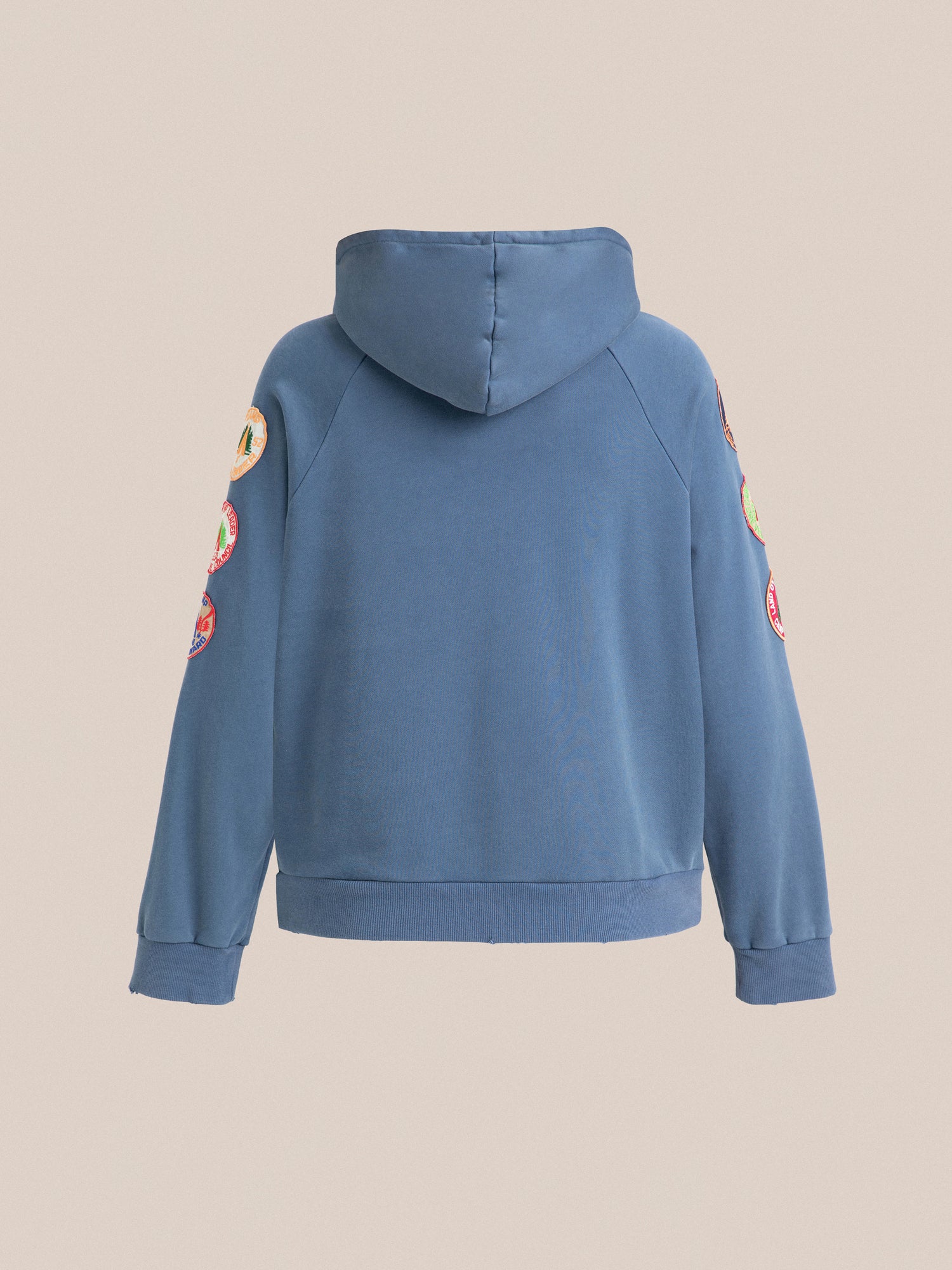 A child's Found Timber Campground Hoodie with colorful appliques and distressed details.