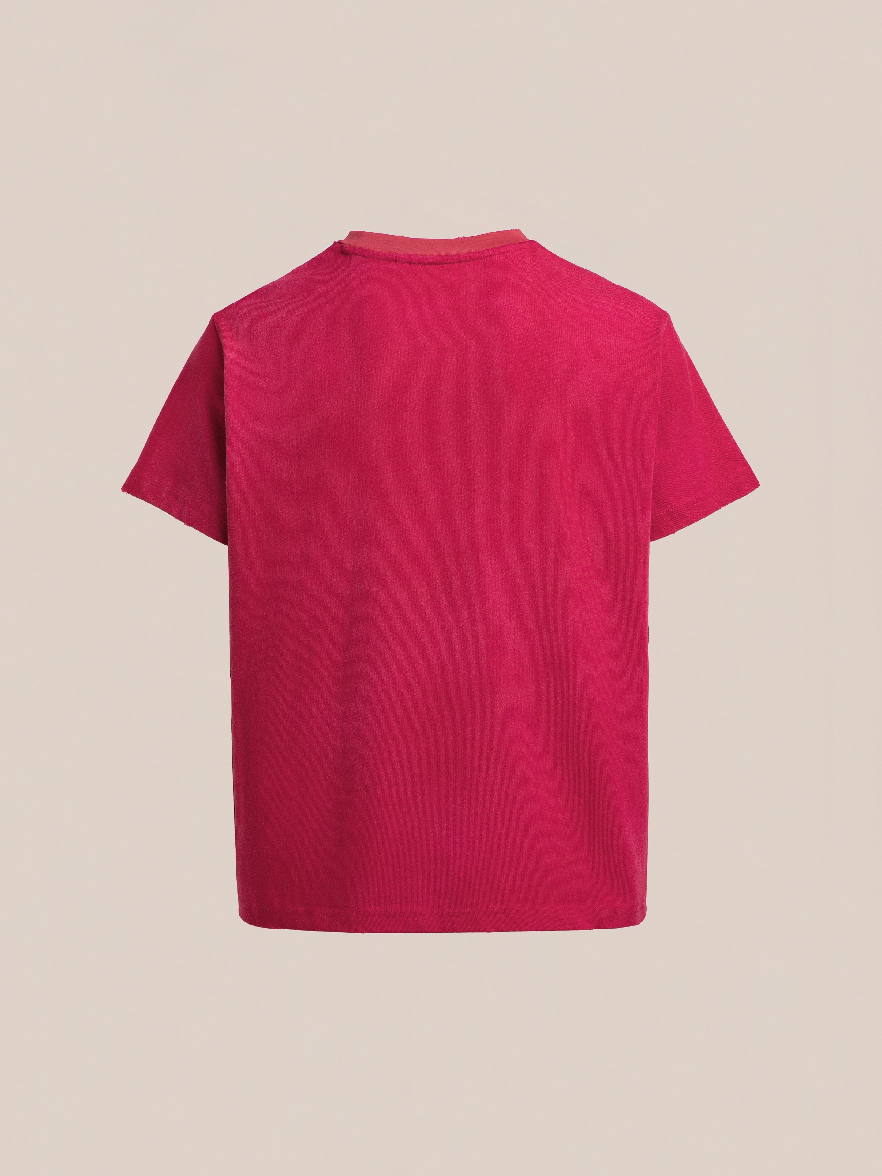 The FOUND Embroidered Wildlife Tee is a plain red short-sleeved shirt, shown from the back on a light beige background, featuring subtle chenille embroidery that adds nature-inspired artistry.