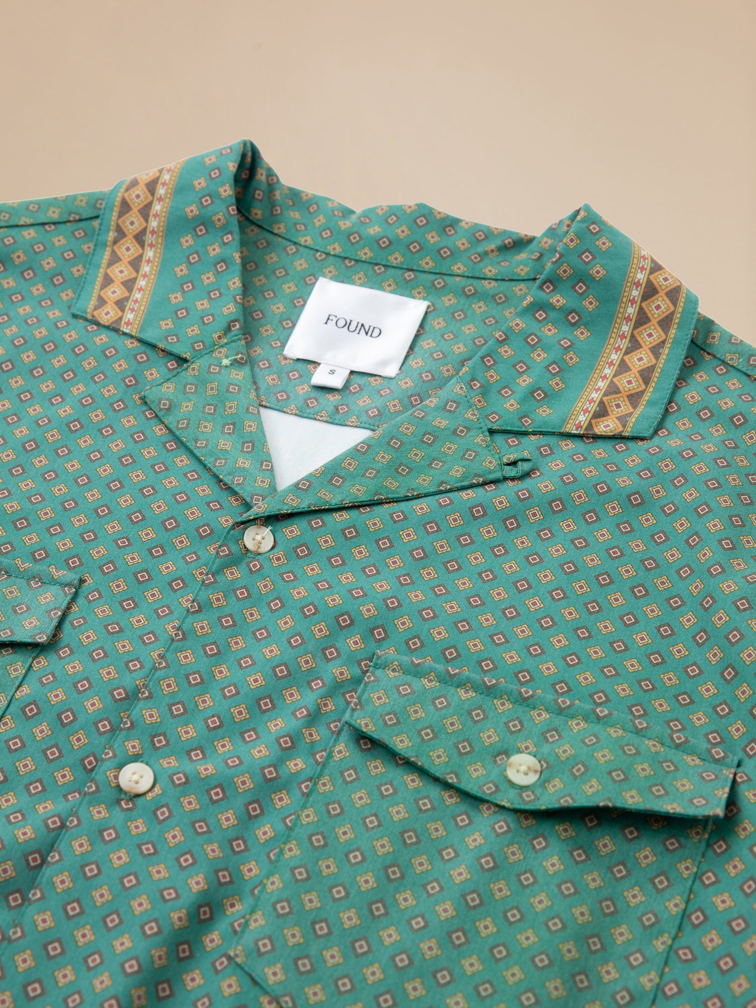A Found Arbor Long Sleeve Camp Shirt with traditional Indo-Aryan patterns.