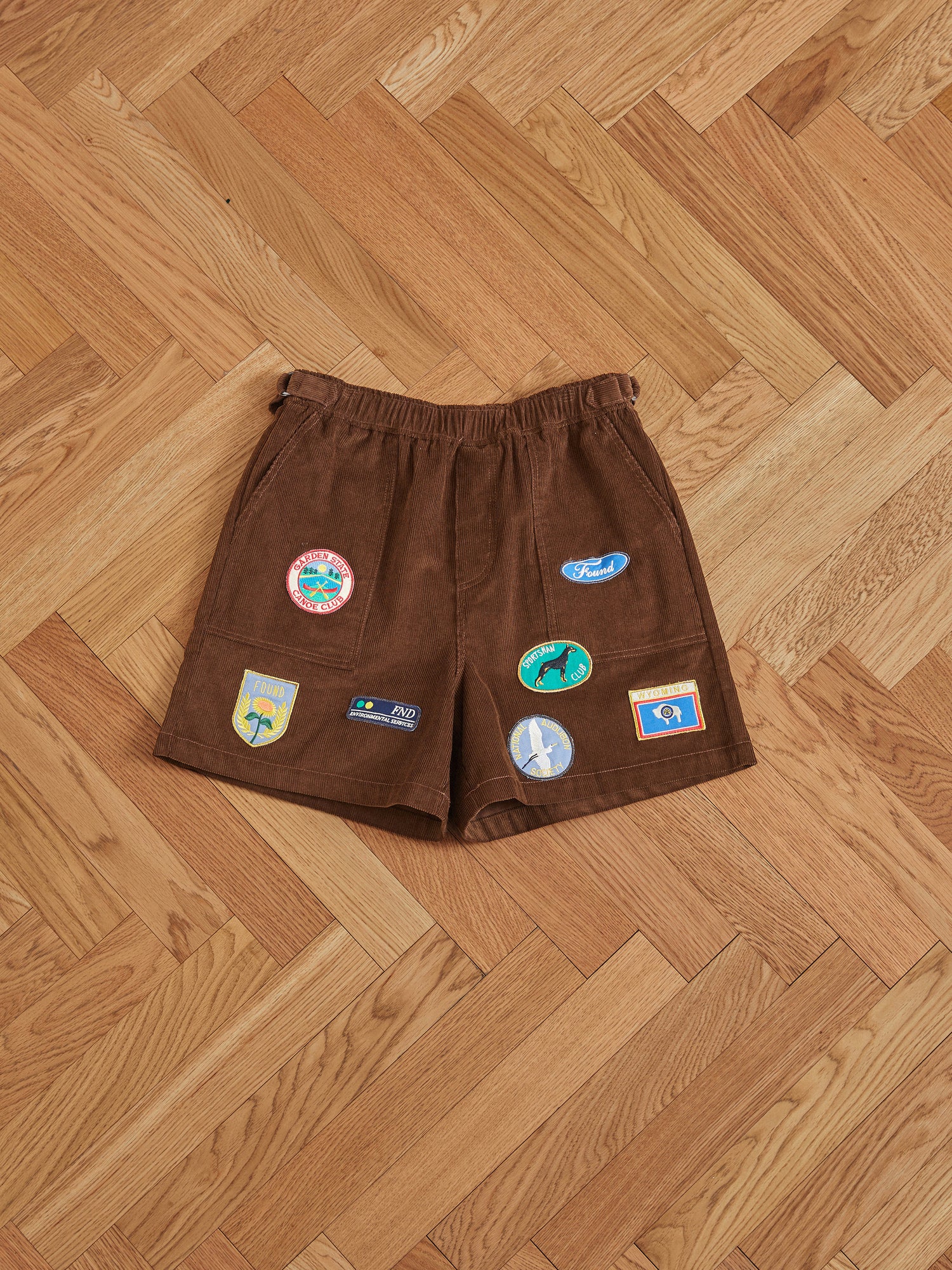 Brown Found Canoe Multi Patch Corduroy Shorts.