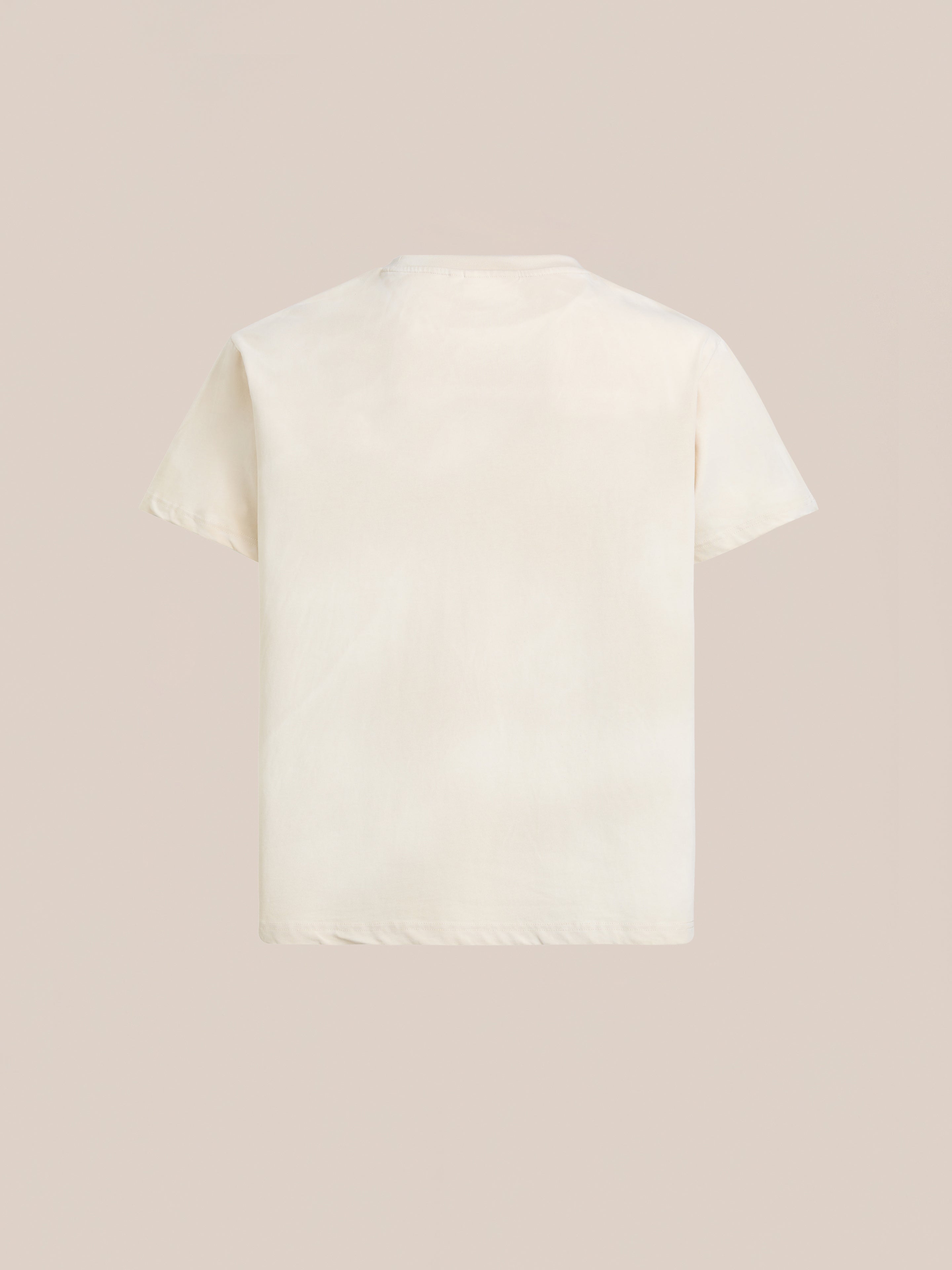 The FOUND Community Hands Tee, a short-sleeved, off-white unisex cotton shirt, is displayed flat with the back side facing up on a beige background.
