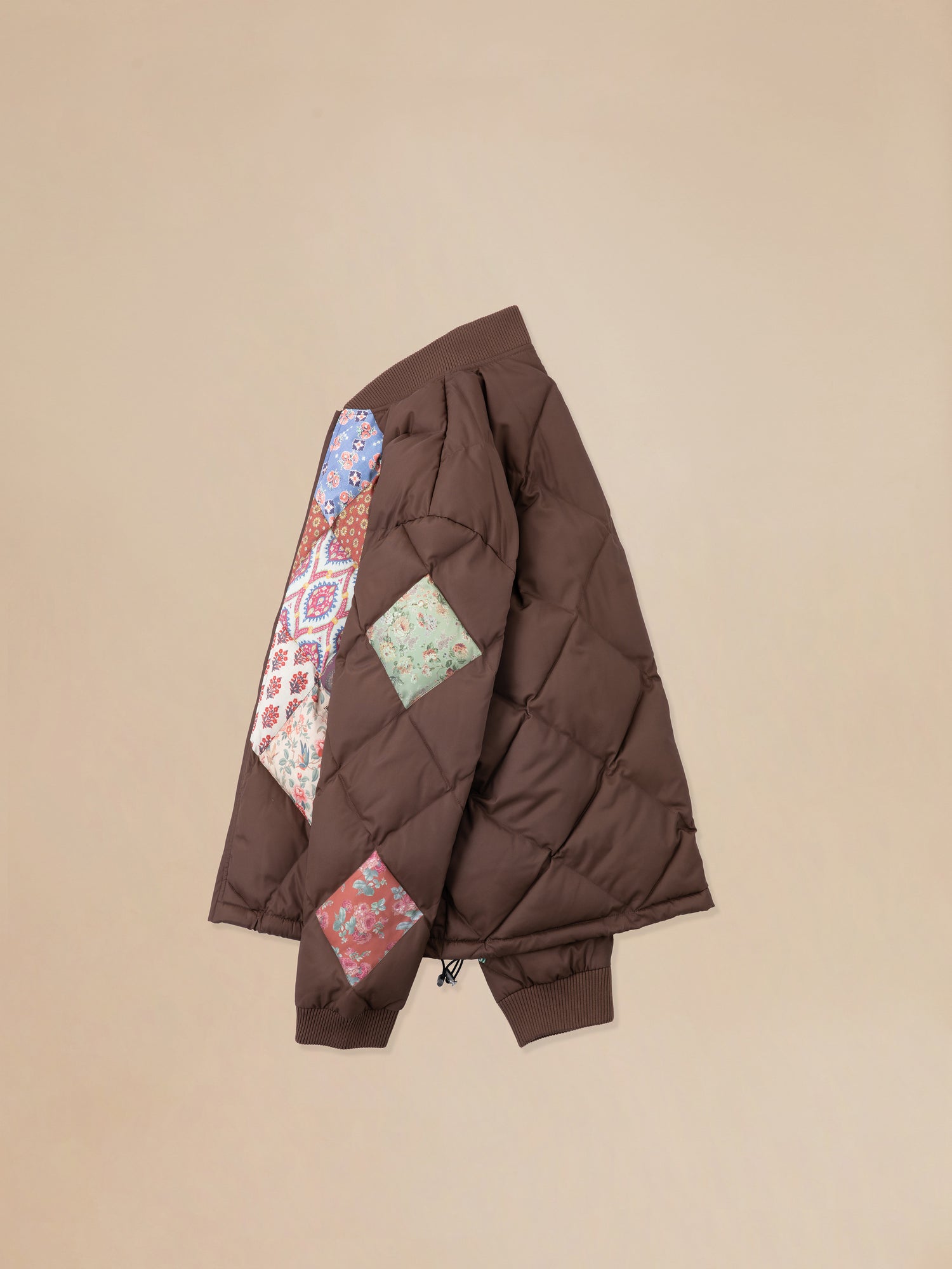 A Found Diamond Quilt Patchwork Jacket with South Asian prints.