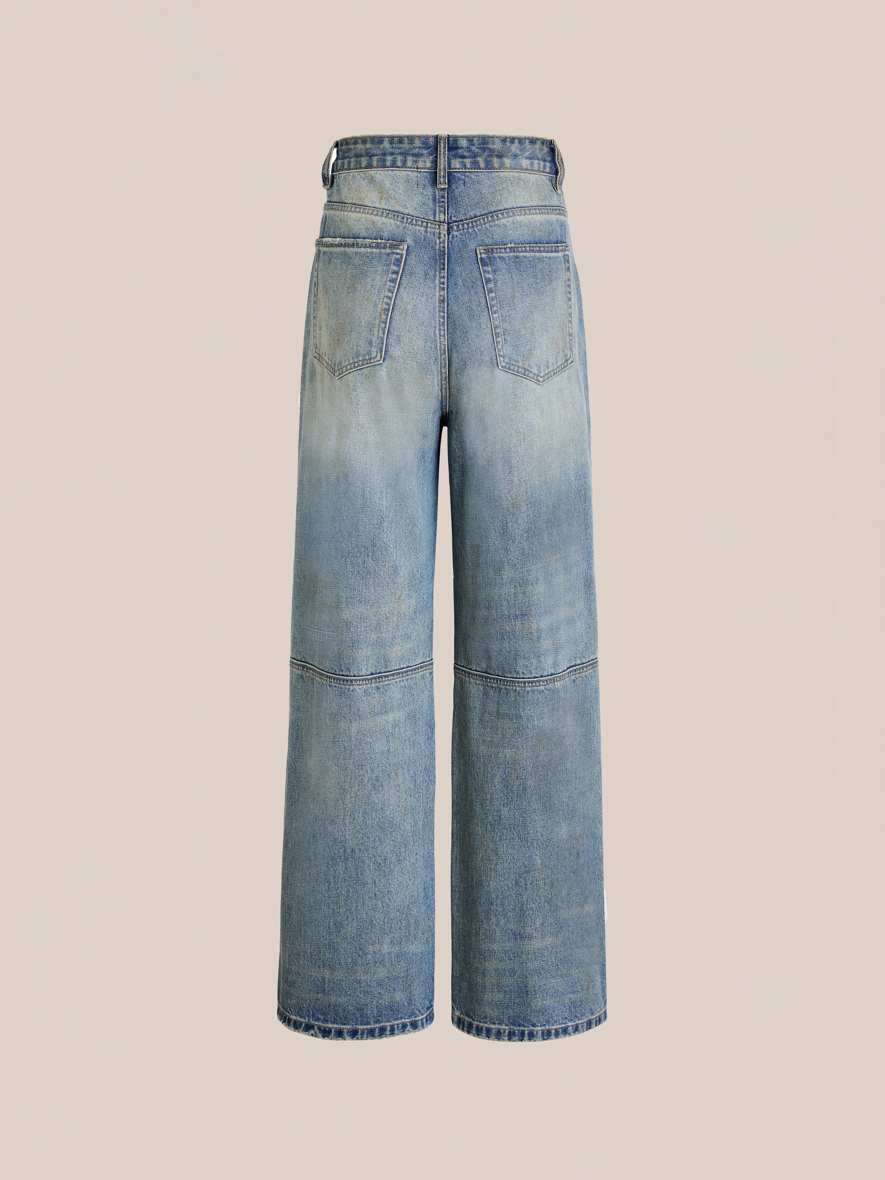 FOUND Double Knee Carpenter Jeans feature a wide-leg, high-waisted relaxed fit with visible seams and two back pockets, shown against a plain beige background.