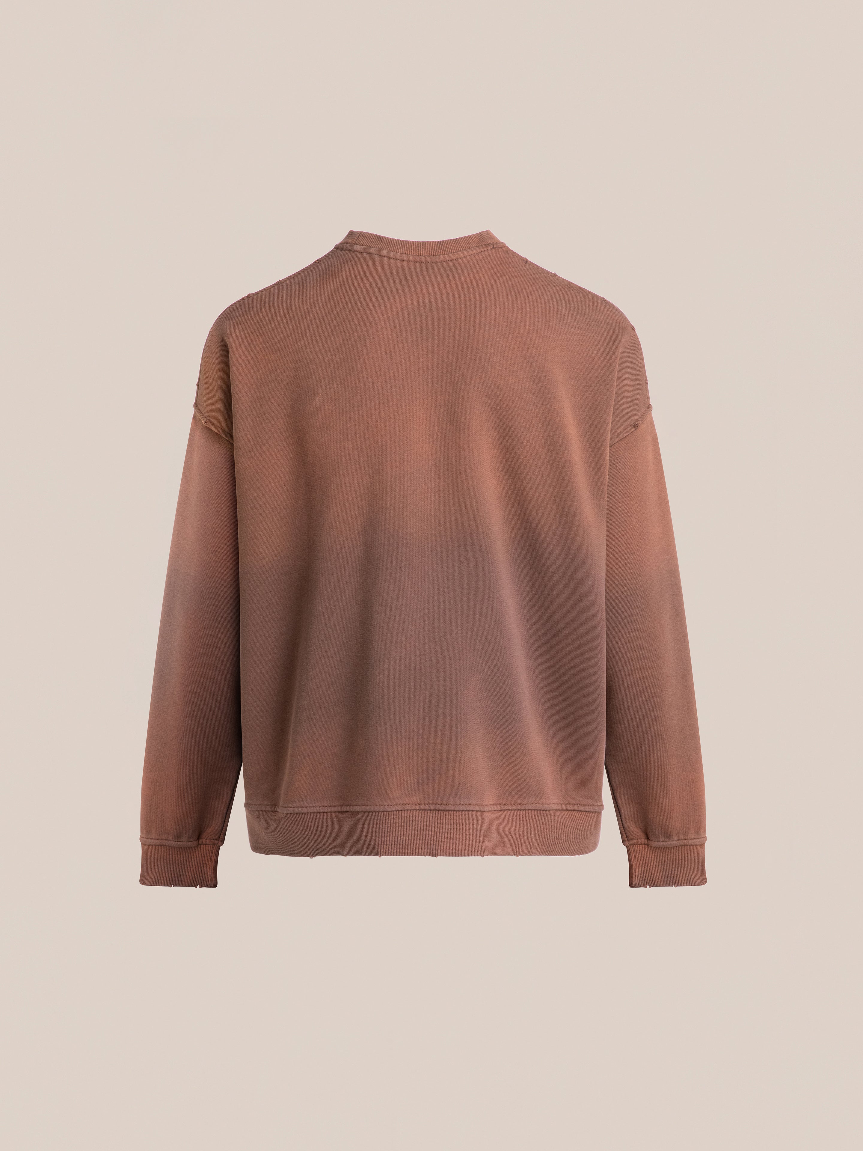 Rear view of a brown, long-sleeved Patterned Logo Crewneck by FOUND, featuring appliqué "FOUND" lettering against a plain background.