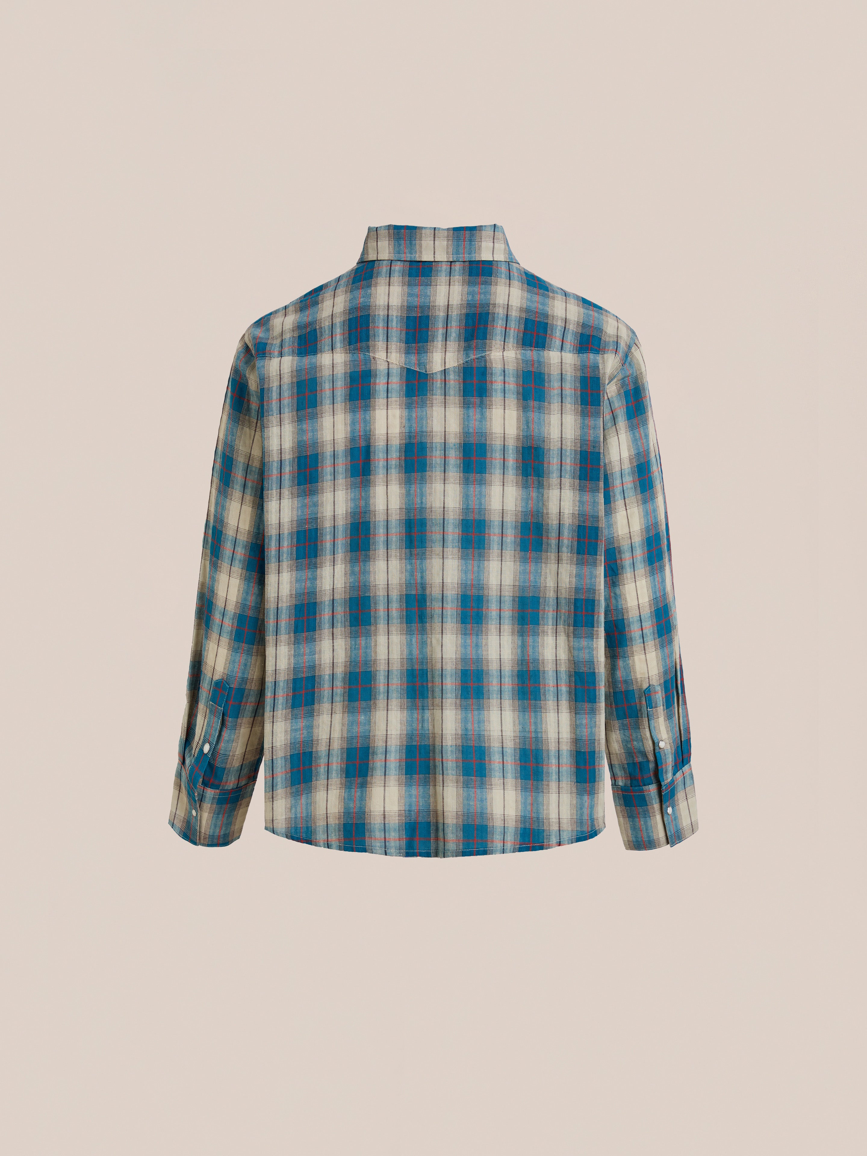 Back view of the FOUND Flannel Shirt, a unisex relaxed-fit, long-sleeve blue and beige Western plaid shirt with a collar and buttoned cuffs, shown against a plain light background.