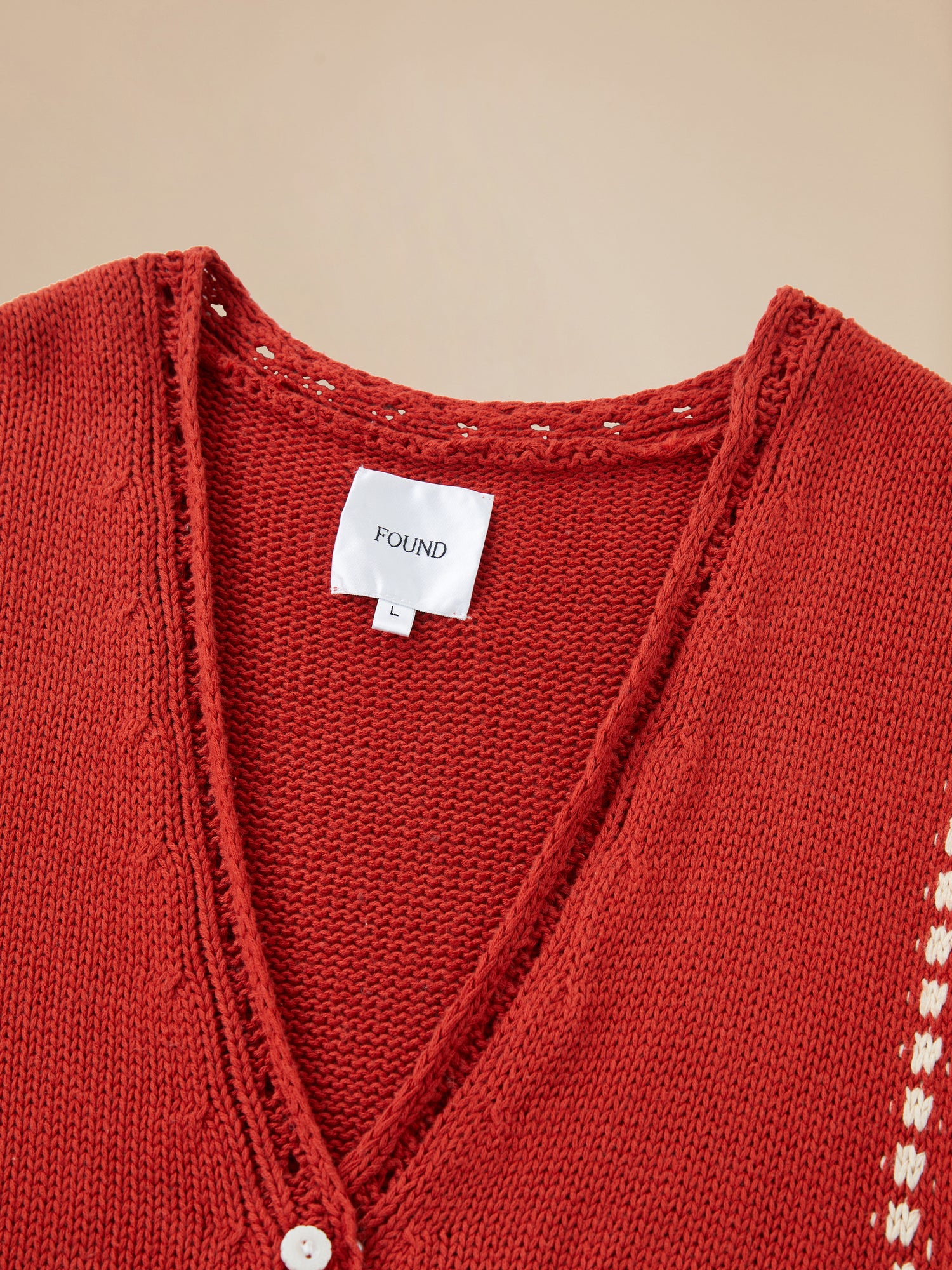 A red Homestead Check Sweater Knit Vest with a Found label on it.