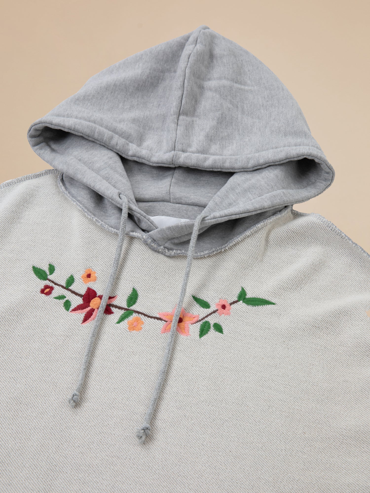 An Inverse Flower Petal Hoodie with flowers on it. (Brand: Found)