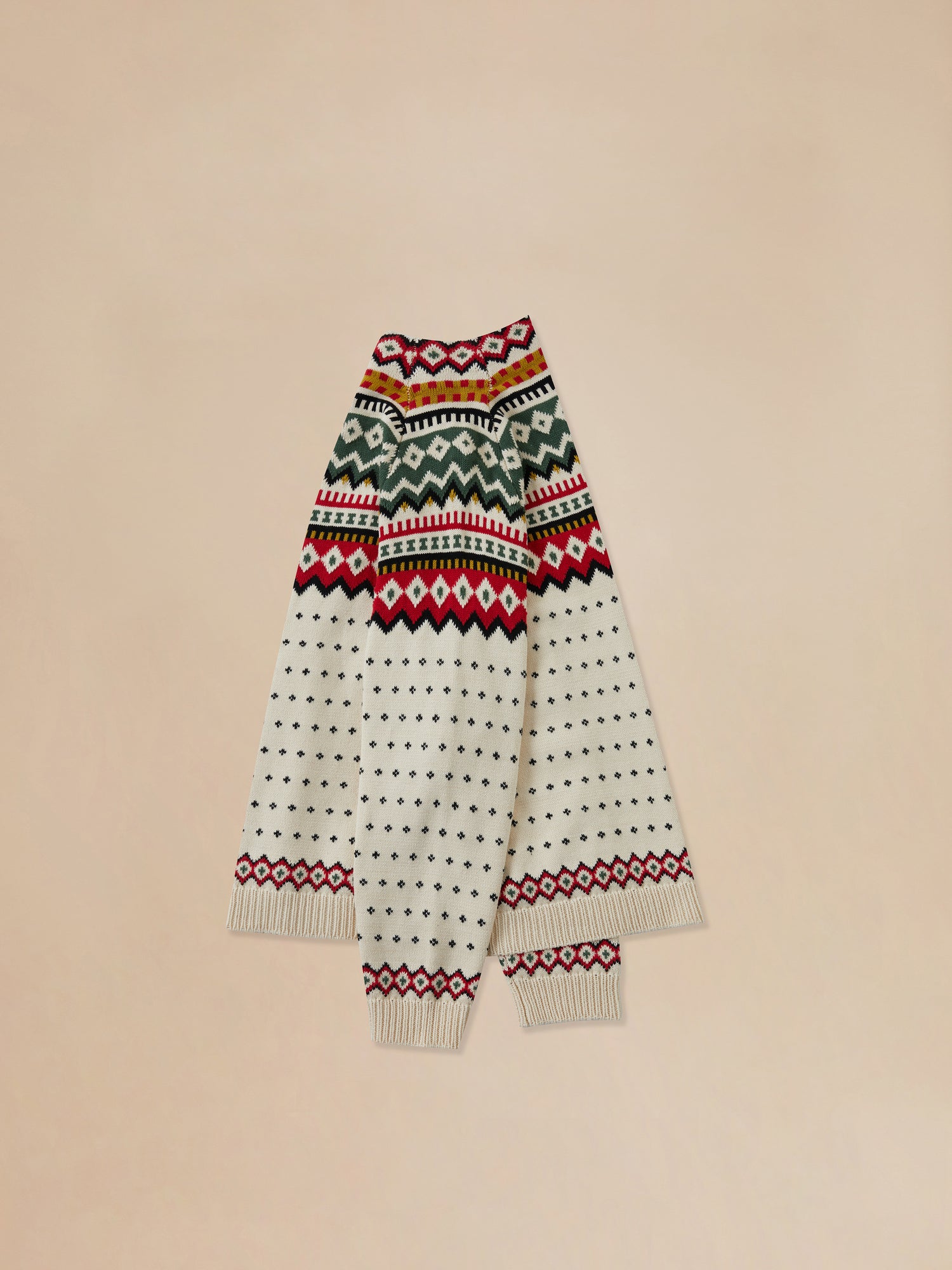 Description: A Harwan Isles sweater displayed on a beige background.
Product Name: Harwan Isles Sweater
Brand Name: Found