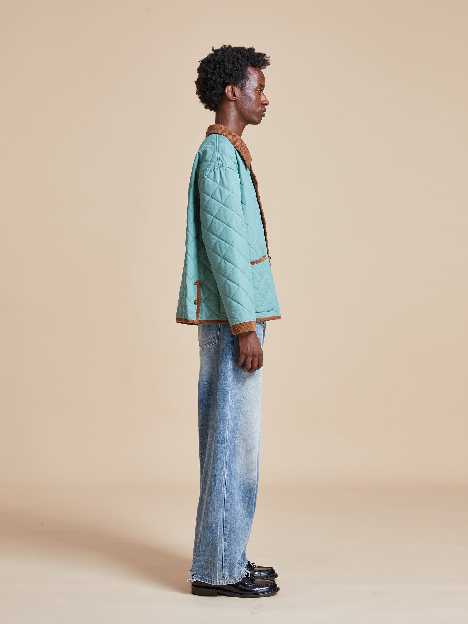 Male model wearing the Kashmir Meadow Quilt Jacket from Found's Fall 2023 collection