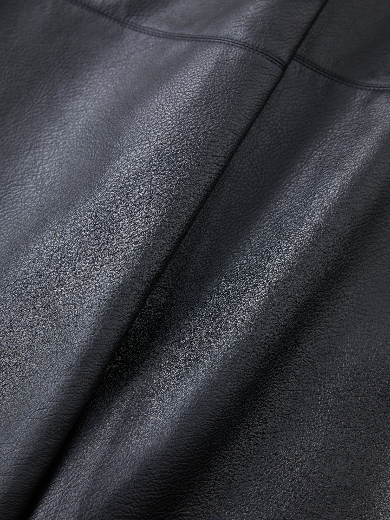 A close up view of a Found Faux Leather Cargo Pants.