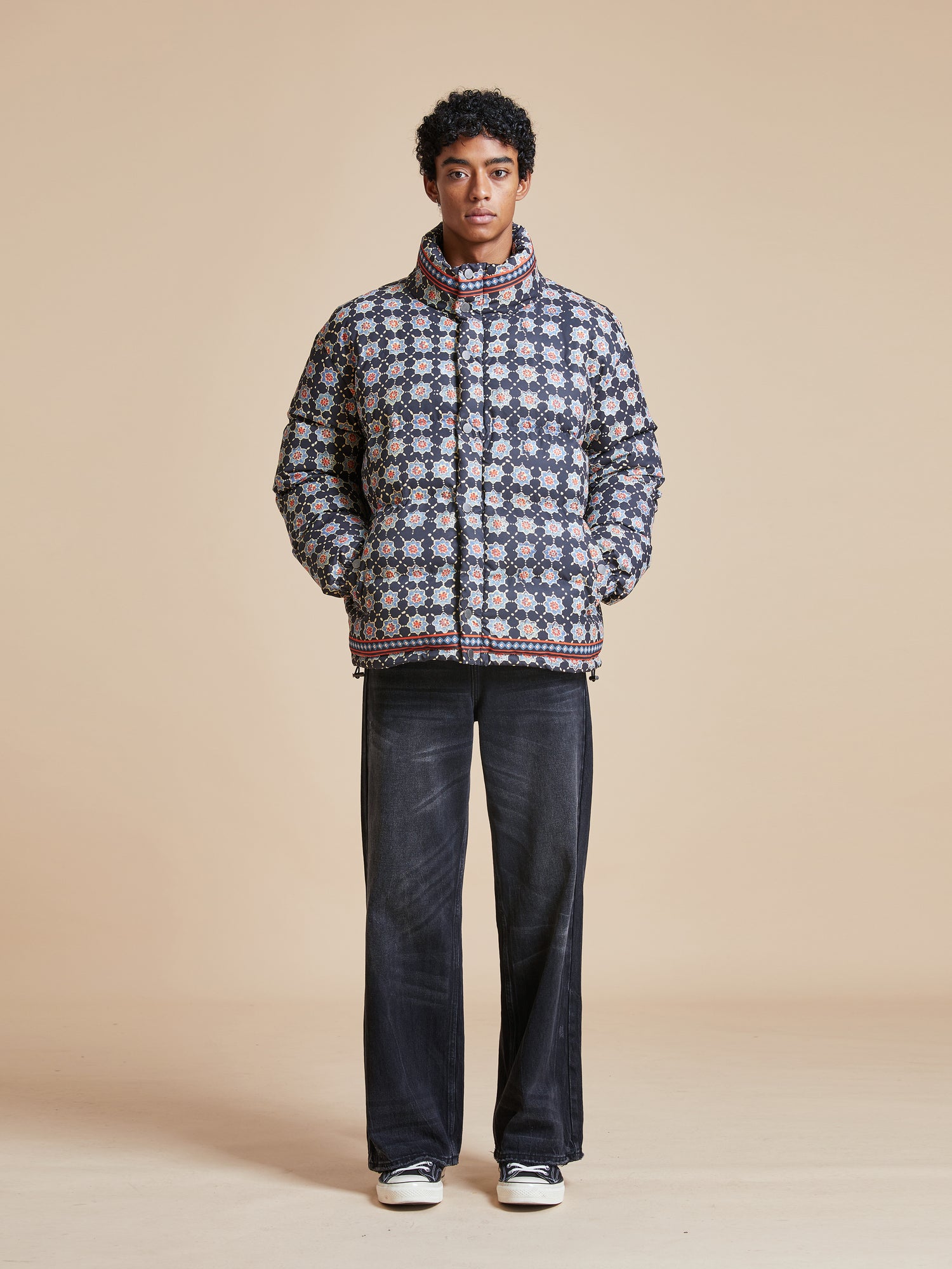 Pre-order the Found Ajrak Block Puffer Jacket featuring Pakistani block-printed patterns.