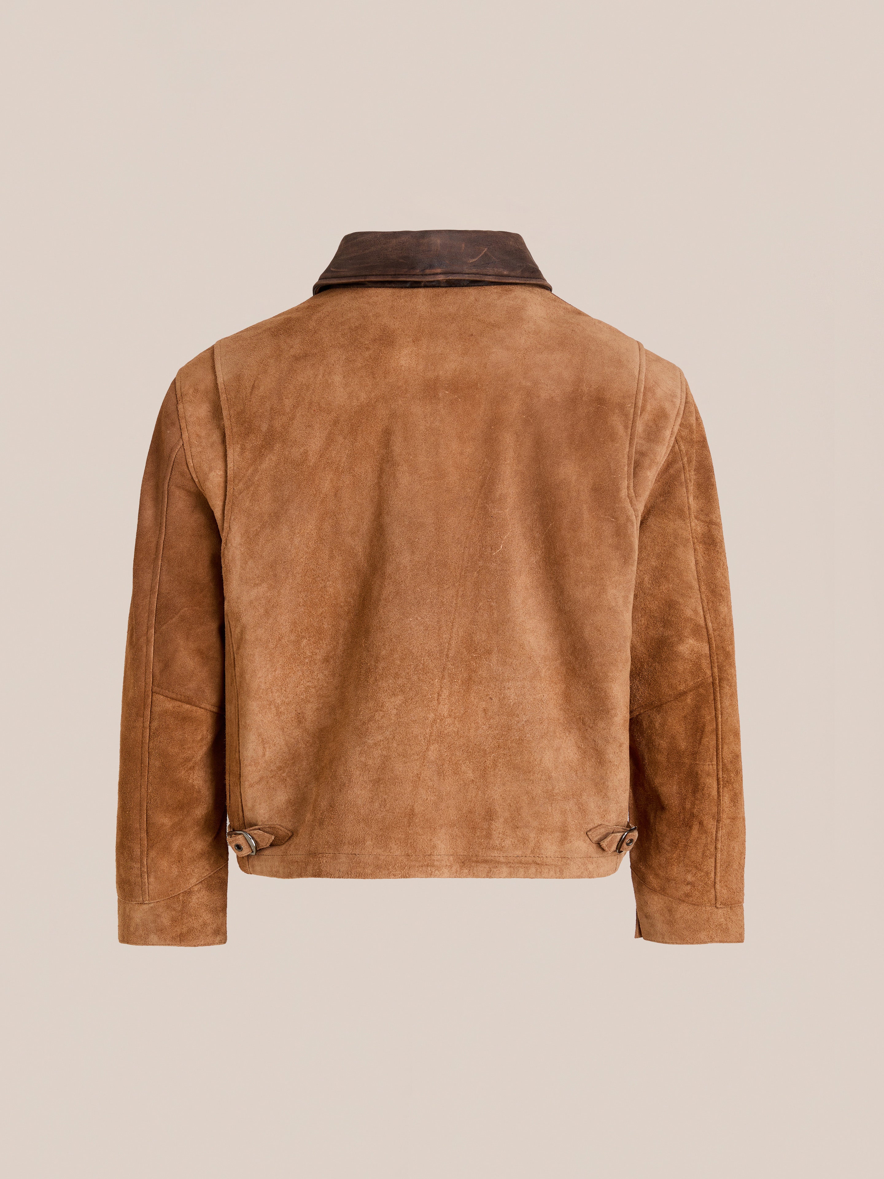 FOUND Suede Western Barn Jacket in brown suede features a dark collar and subtle western yoke stitching, displayed from the back against a plain beige background.