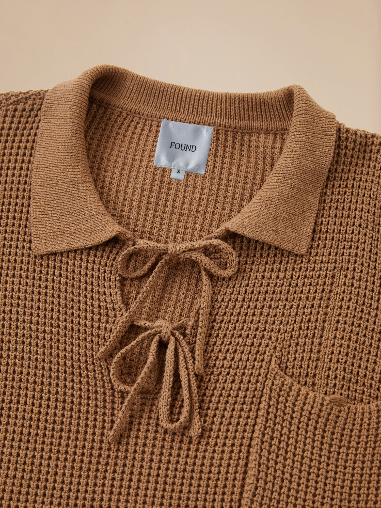 A cozy Found Tie-Collar Knit Sweater in a ginger color.