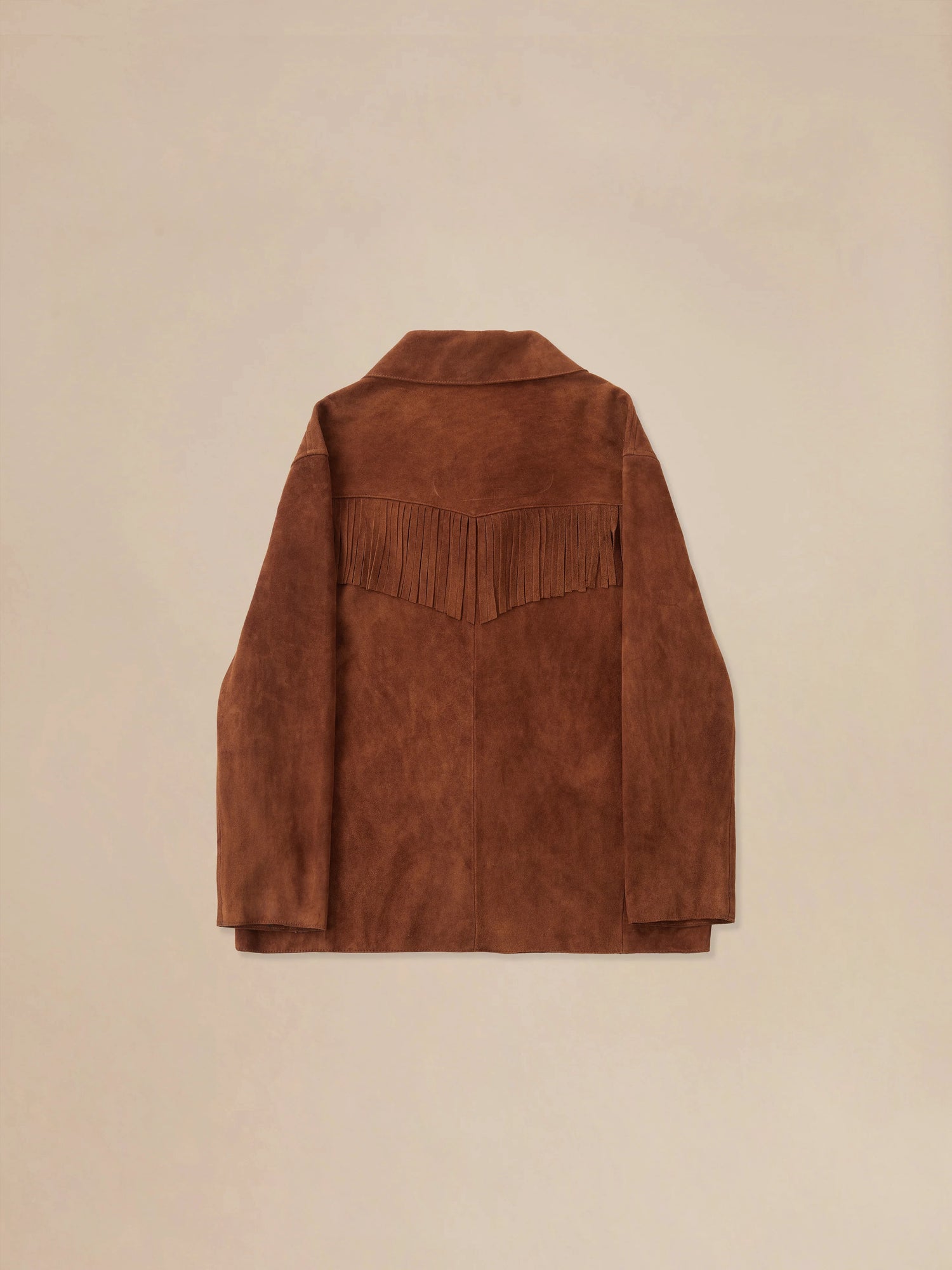 A Found Tobacco Fringe Suede Buckle Jacket with fringes.