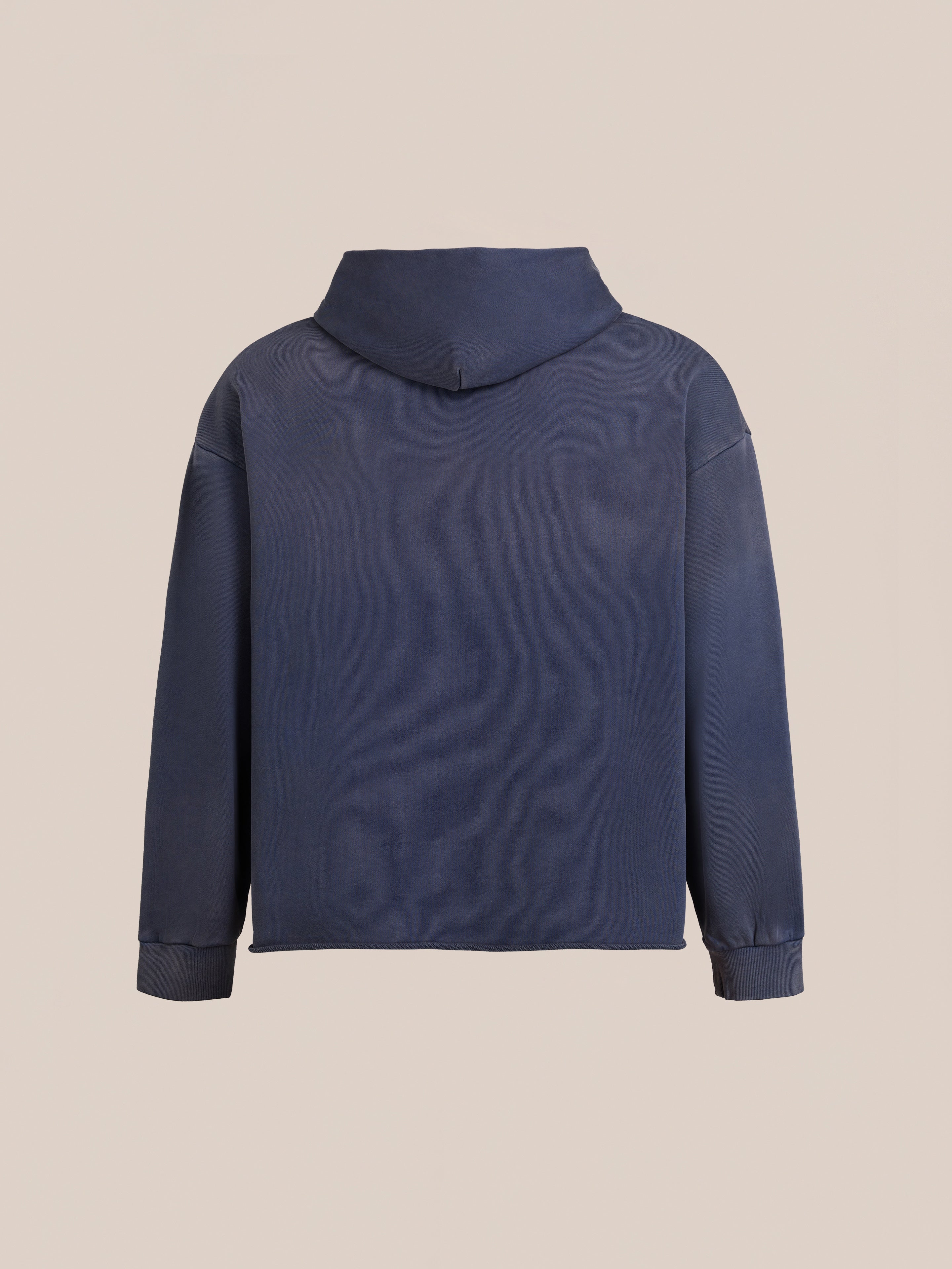 The FOUND Embroidered Wildlife Hoodie in navy blue features chenille embroidery and a unisex relaxed fit, shown from the back against a plain beige background.