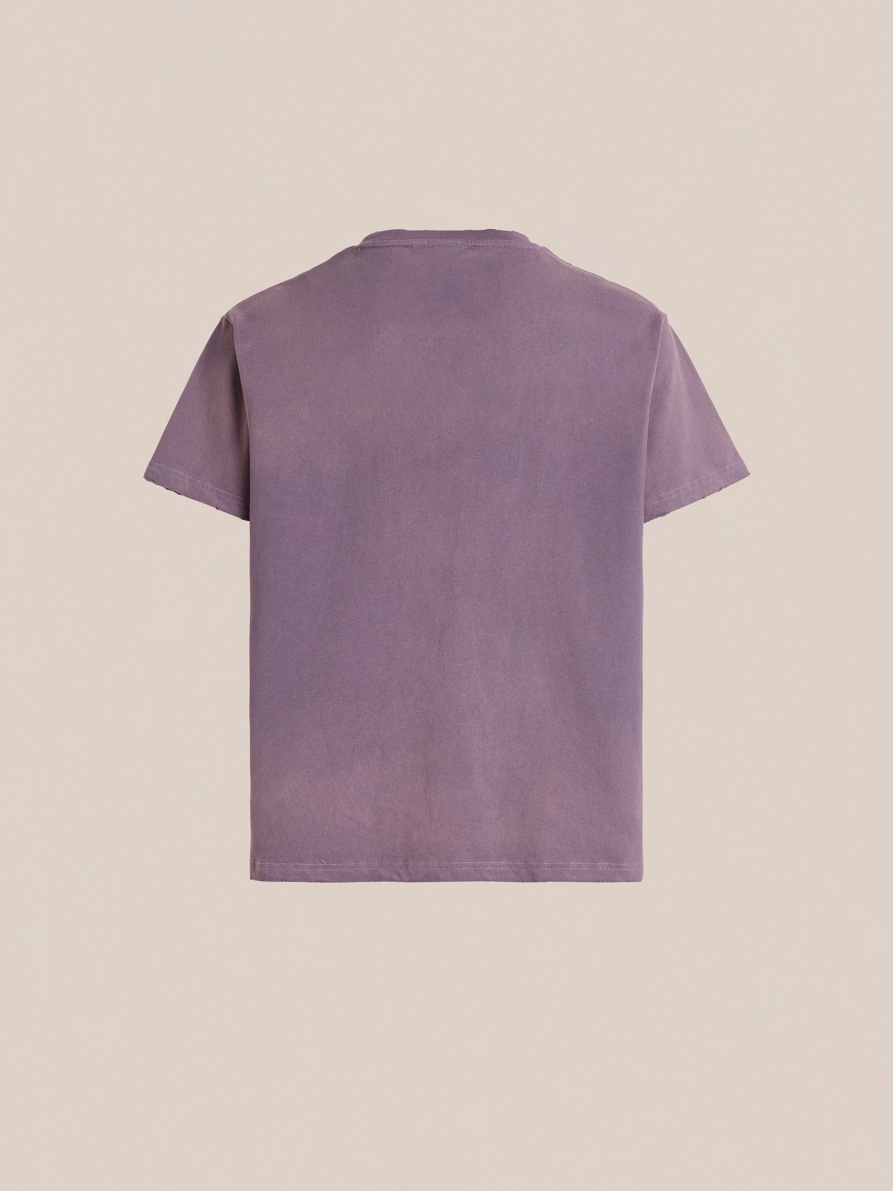 The FOUND Embroidered Wildlife Tee is a plain, short-sleeve, purple shirt with an embroidered design, shown from the back against a neutral background.