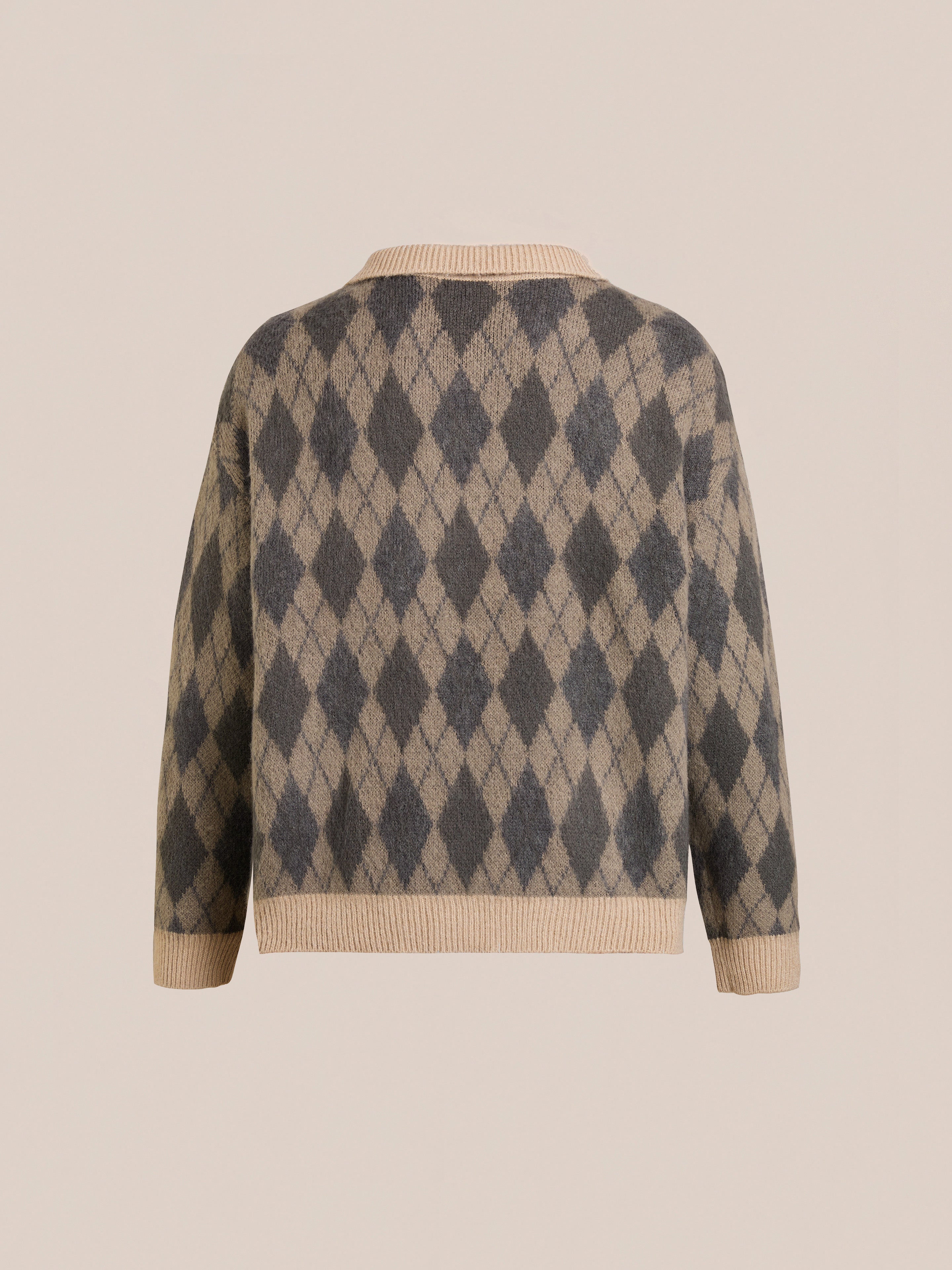 Back view of the FOUND Argyle Cardigan in beige and gray wool blend with argyle pattern, ribbed collar, cuffs, and hem in a relaxed fit, shown against a plain light background.