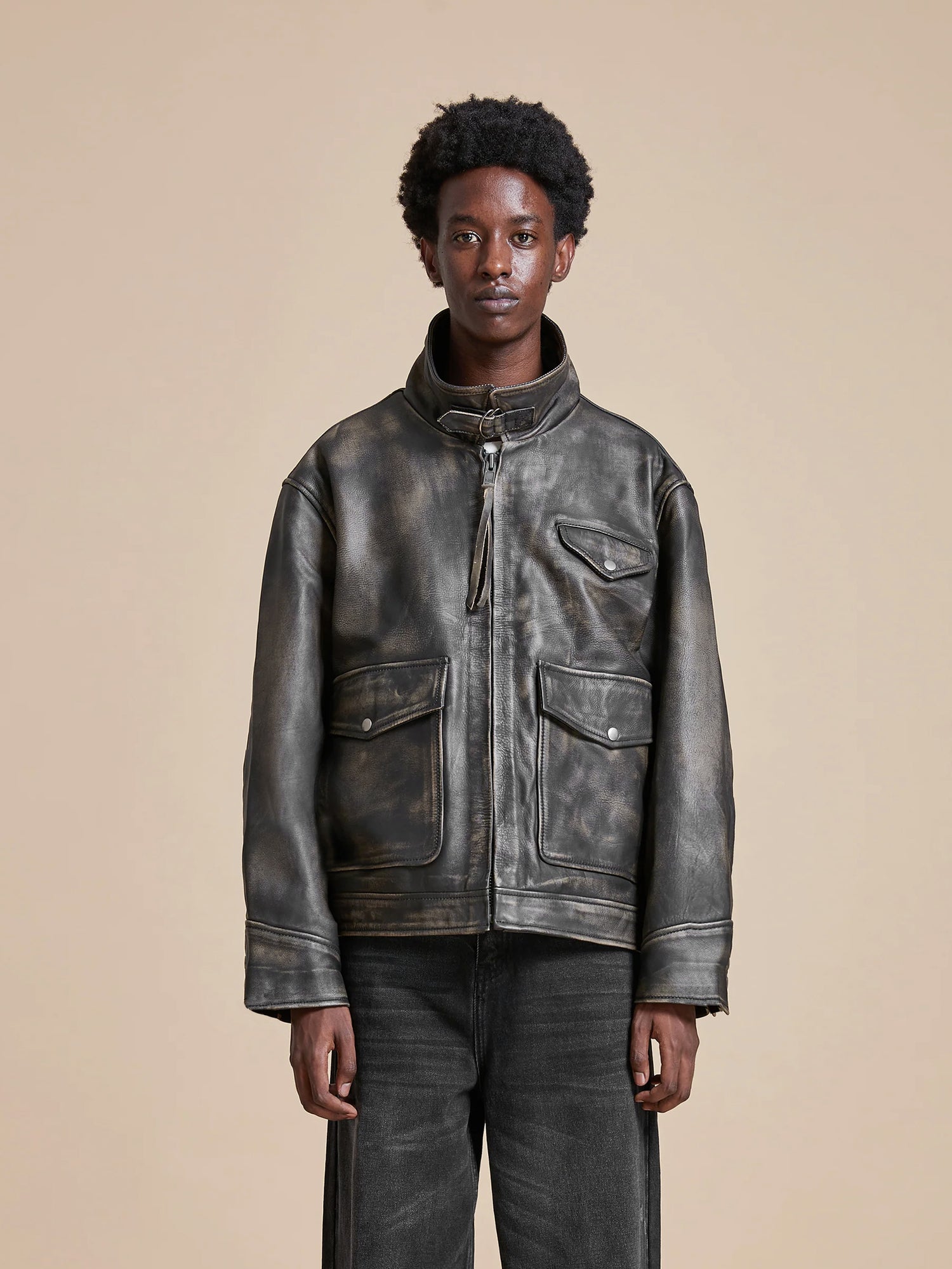 A man wearing a Found Distressed Leather Pocket Jacket.