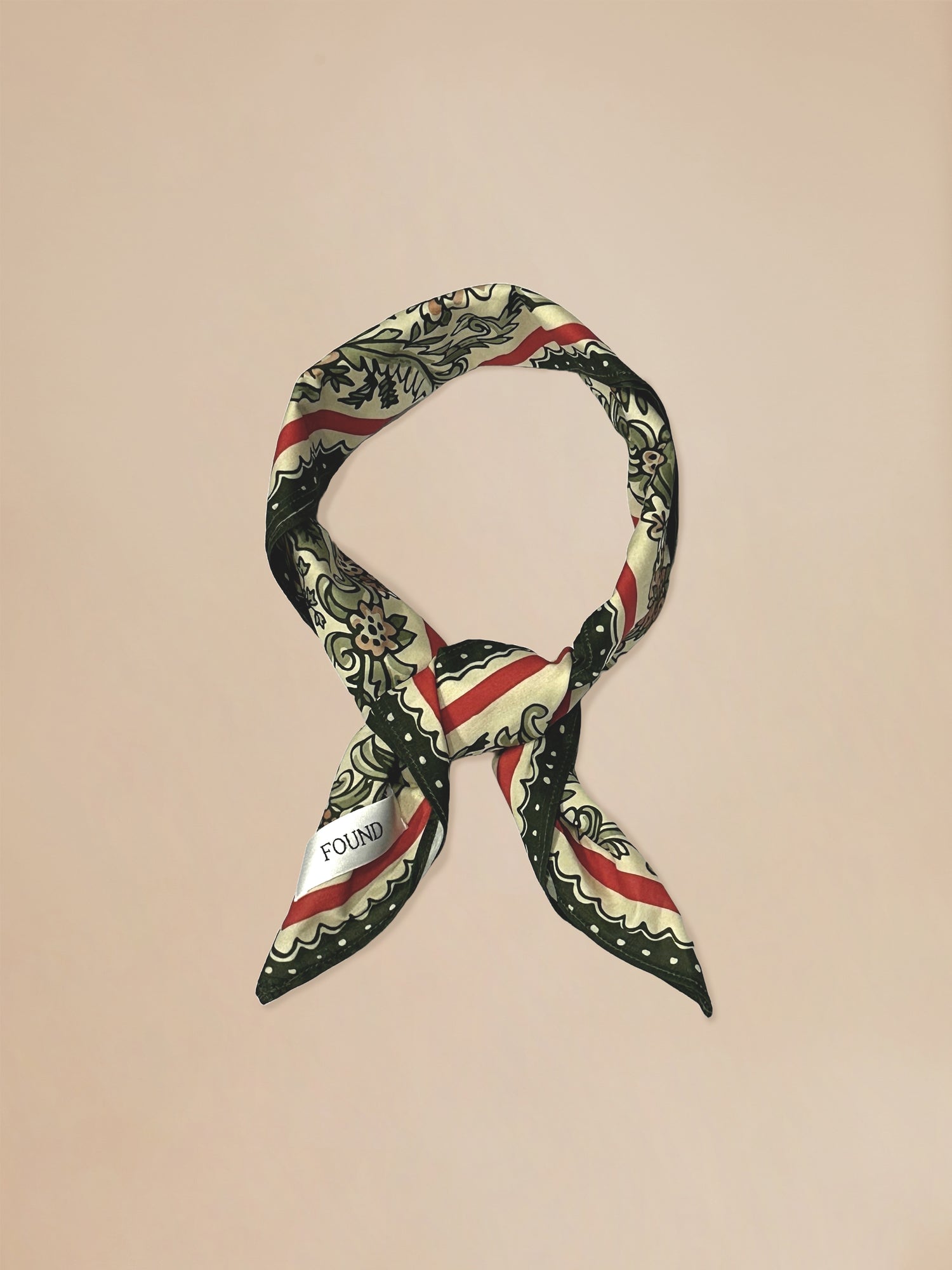 A Floral Garden Bandana with a red, white and blue pattern by Found.