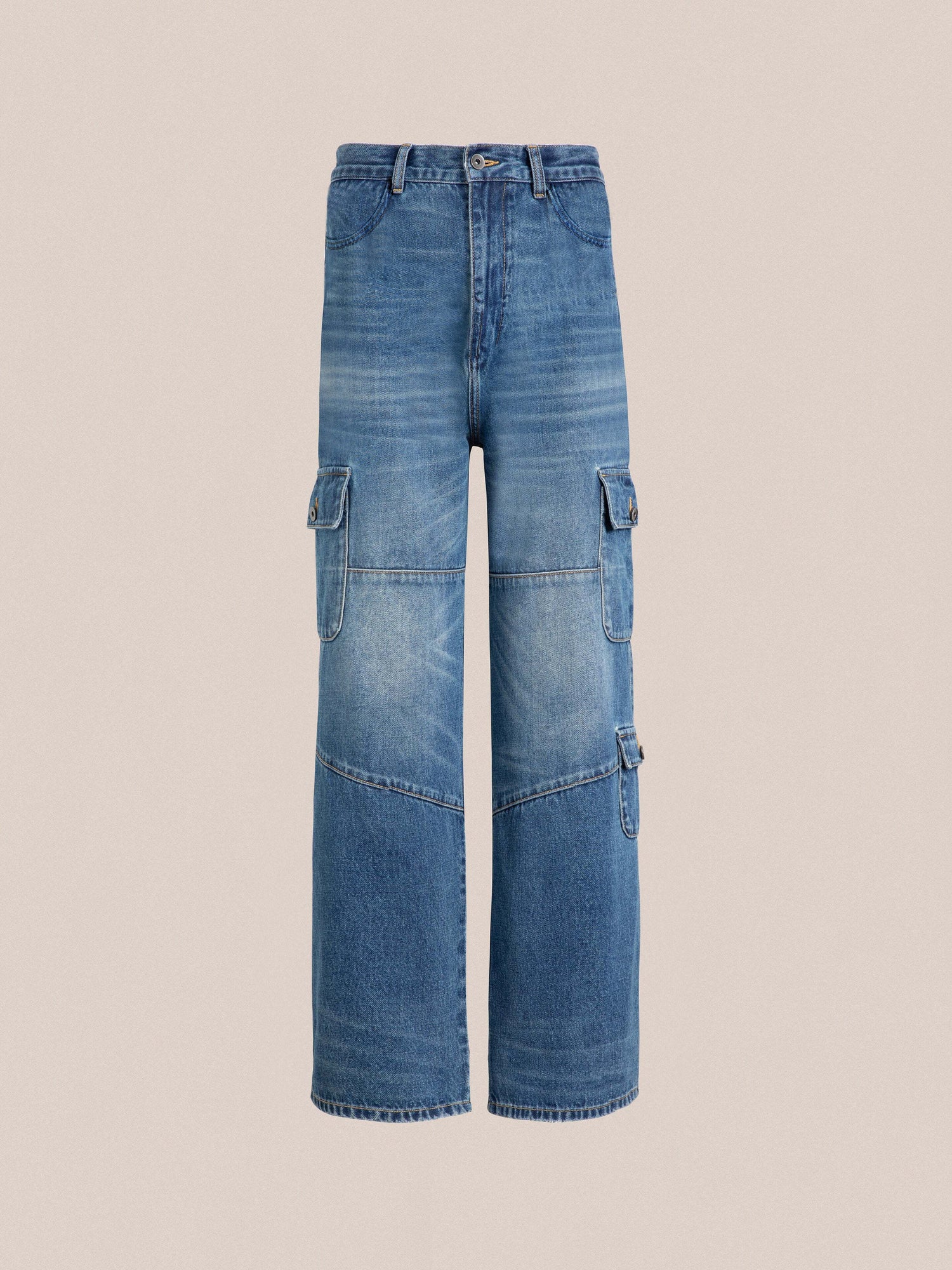 Siwa Cargo Paneled Jeans with knee-length legs and cargo pockets, displayed against a plain, light background by Found.