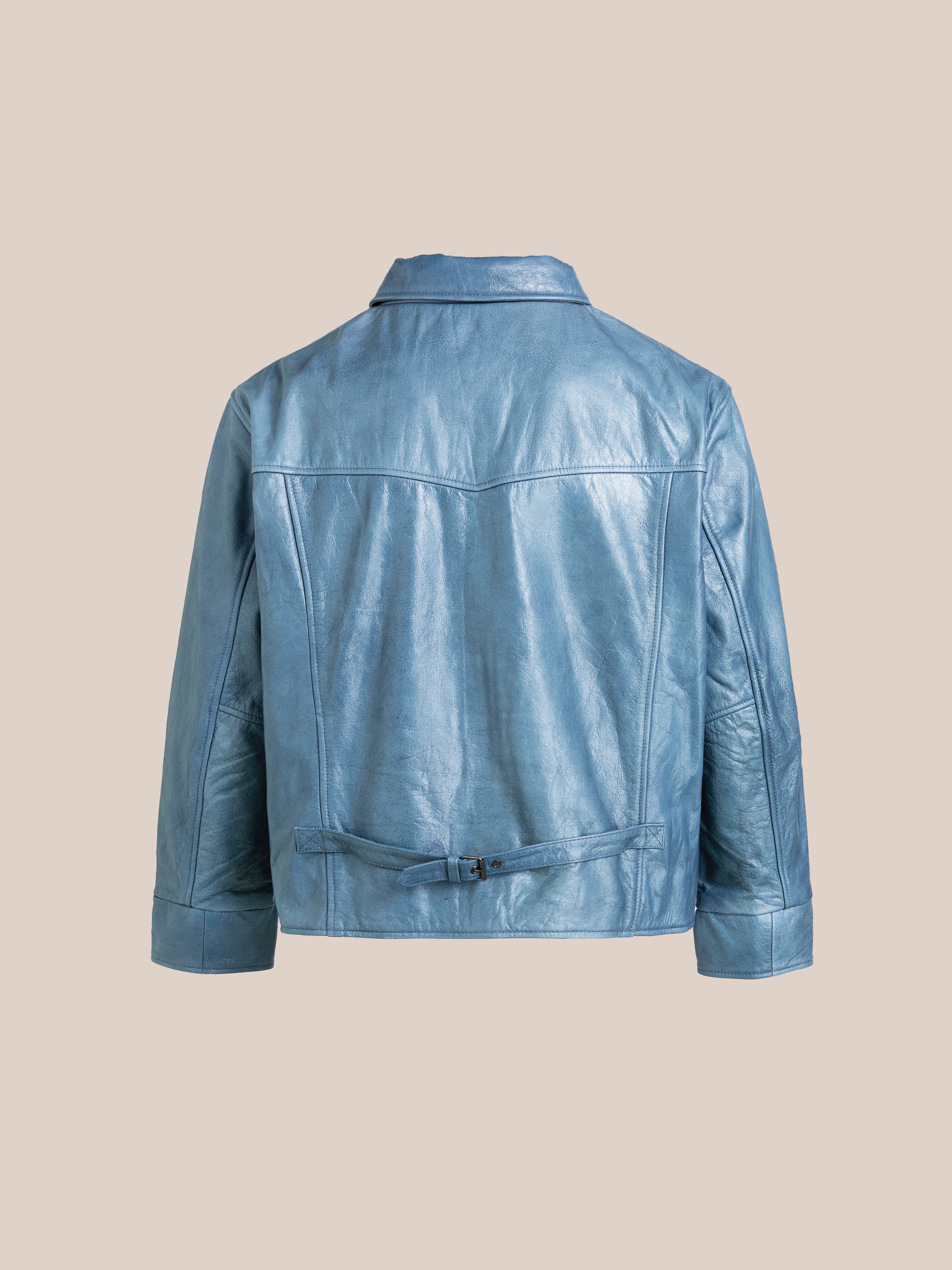Back view of the Marlboro Sun Faded Leather Racer Jacket by FOUND, featuring a unisex relaxed fit, set against a beige background.