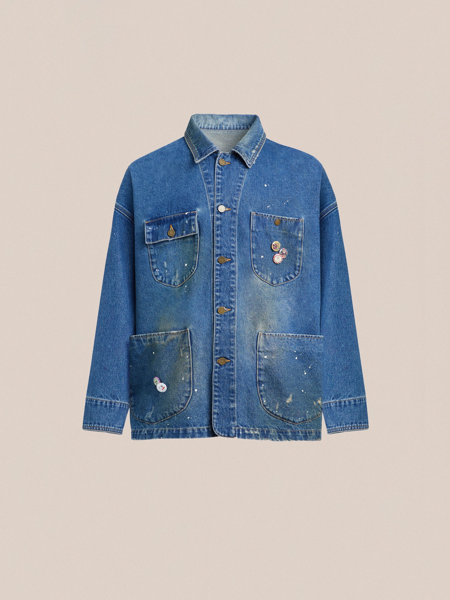 A blue Kavir denim painter jacket with patches on the sleeves and pockets by Found.