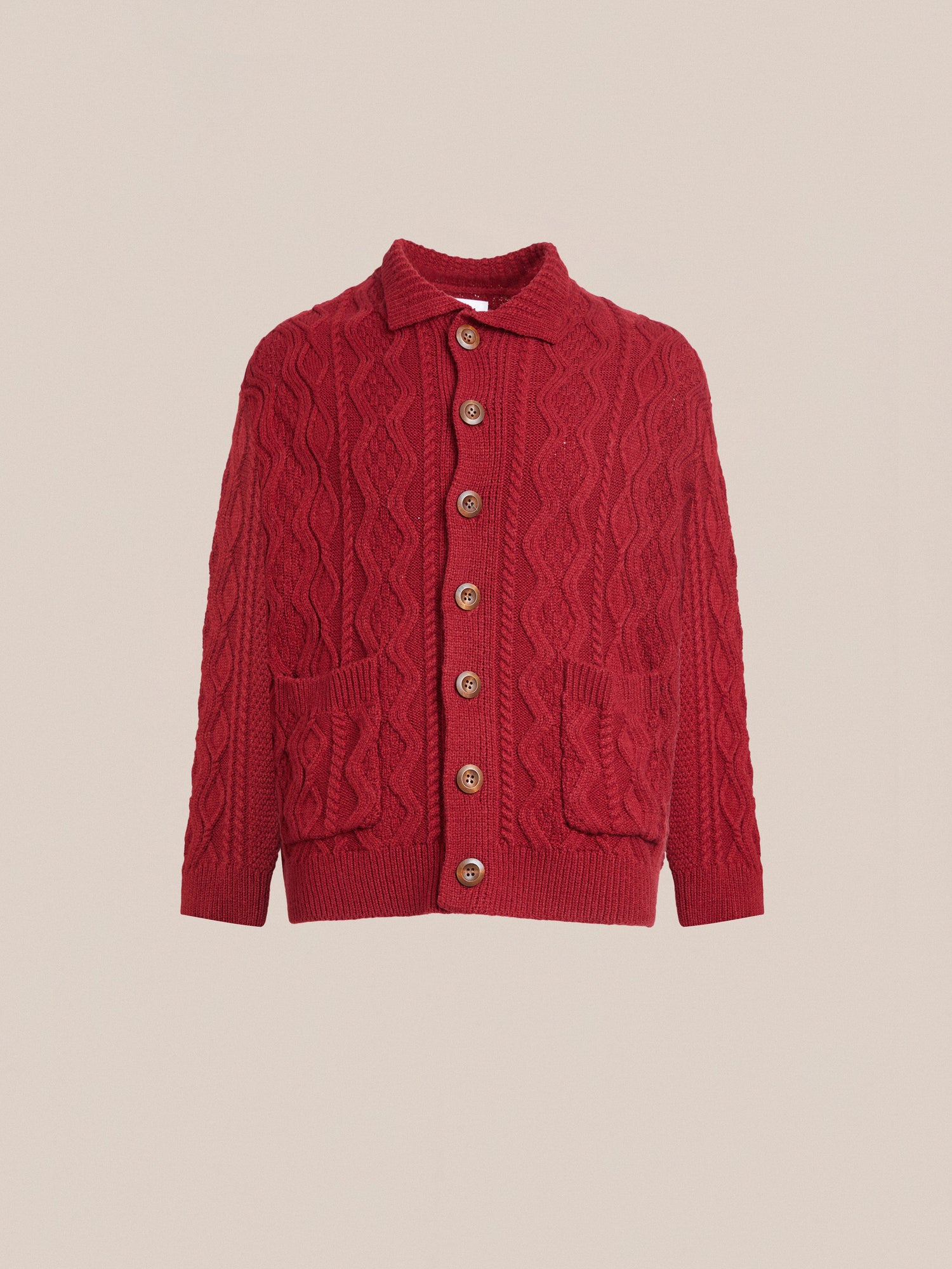 A Found Parsidan cable knit cardigan with buttons.