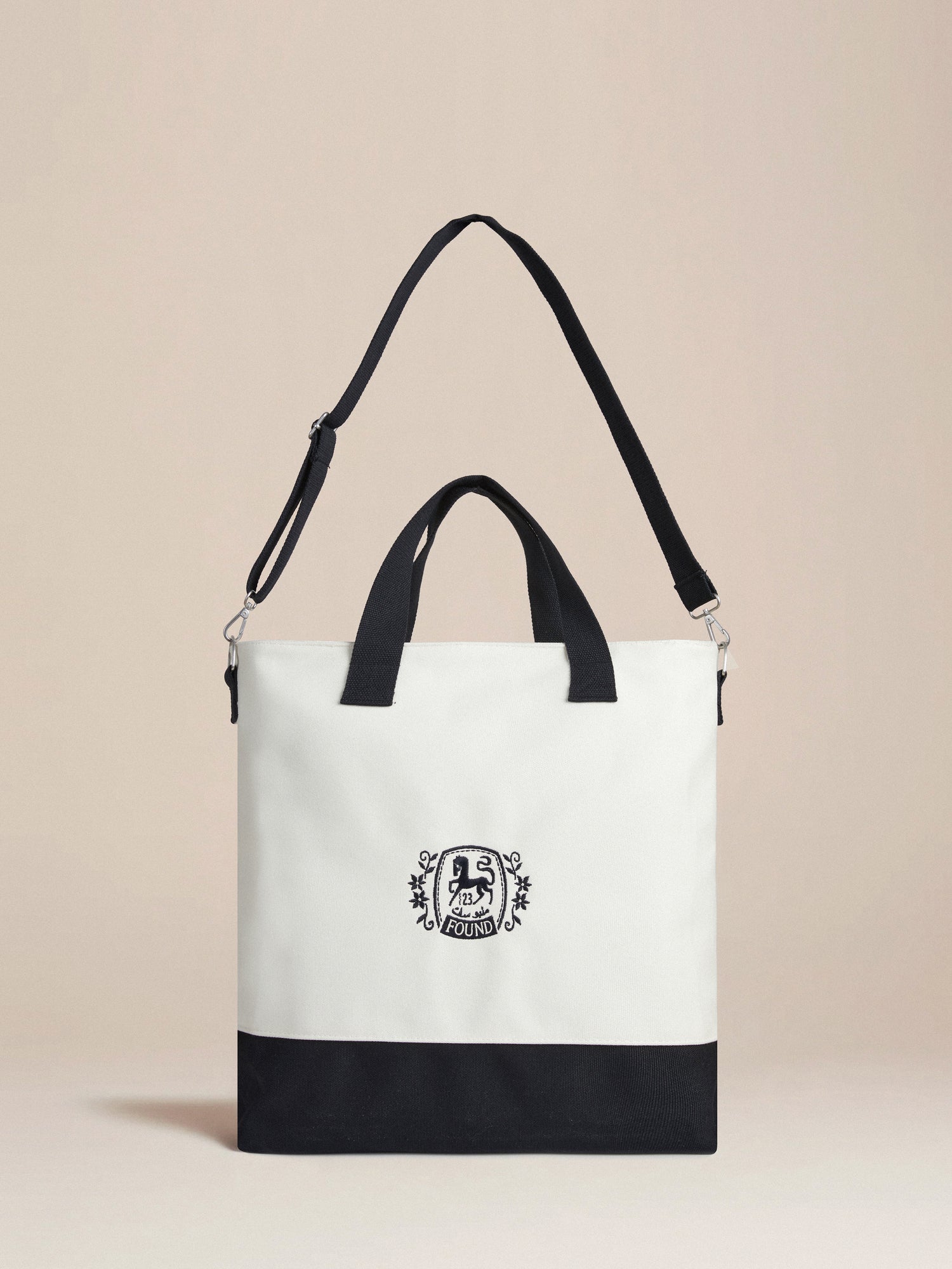 A black and white Profound Horse Logo Crest Canvas Bag made from premium cotton twill.