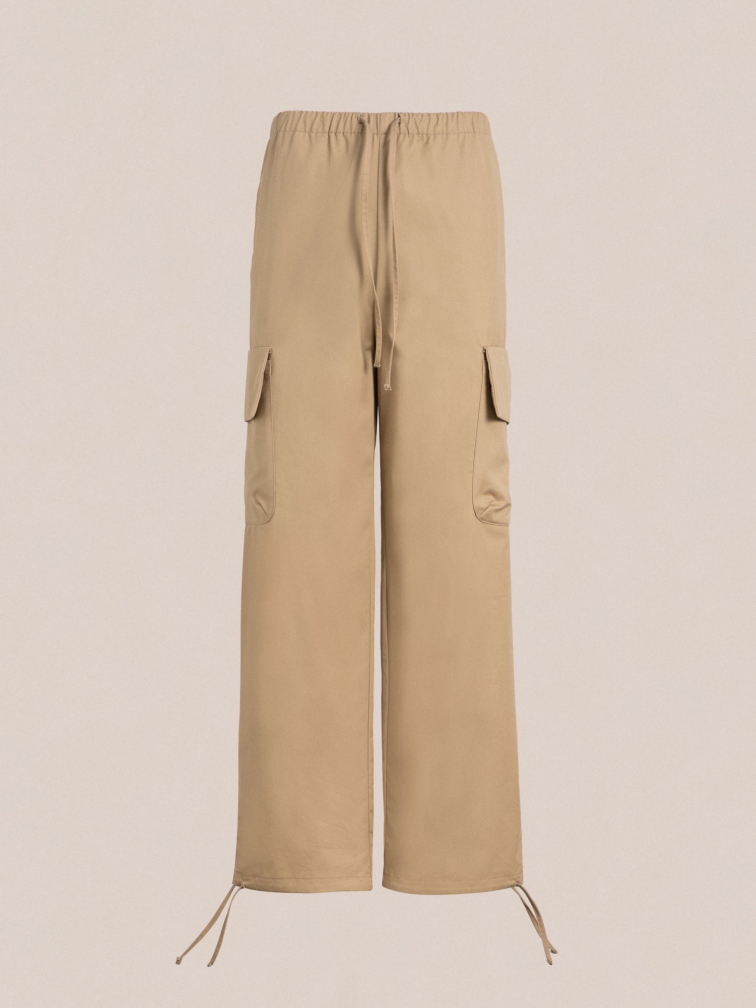 A women's Twill cargo drawstring pants in tan by Found.