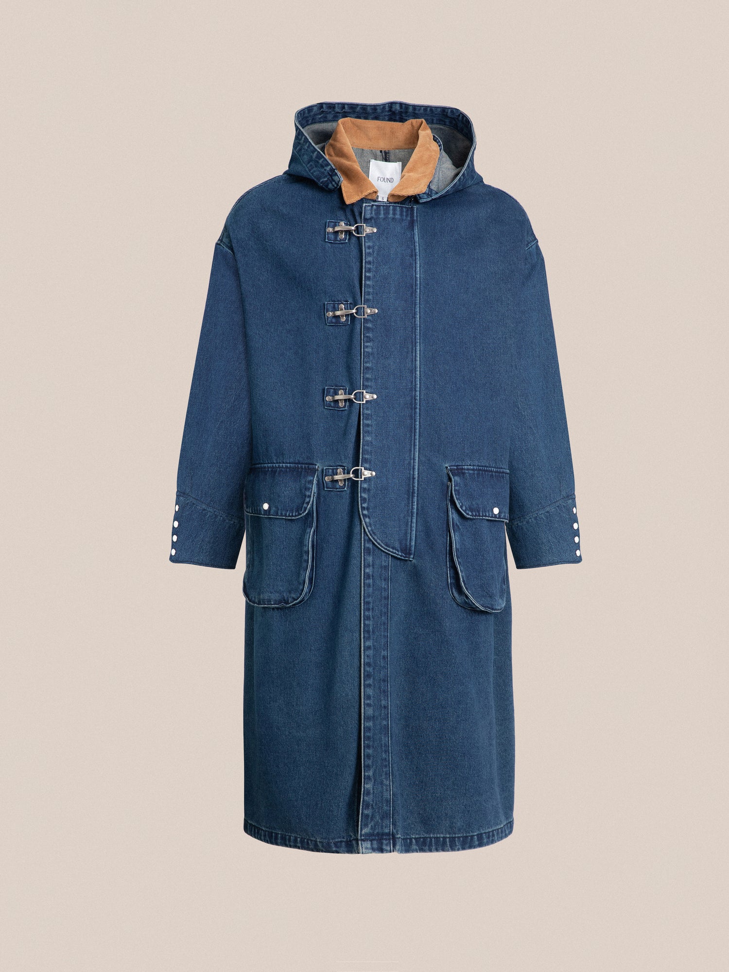 A Sargasso Denim Buckle Coat with a hood, oversized pockets, and a hooded hood by Found.