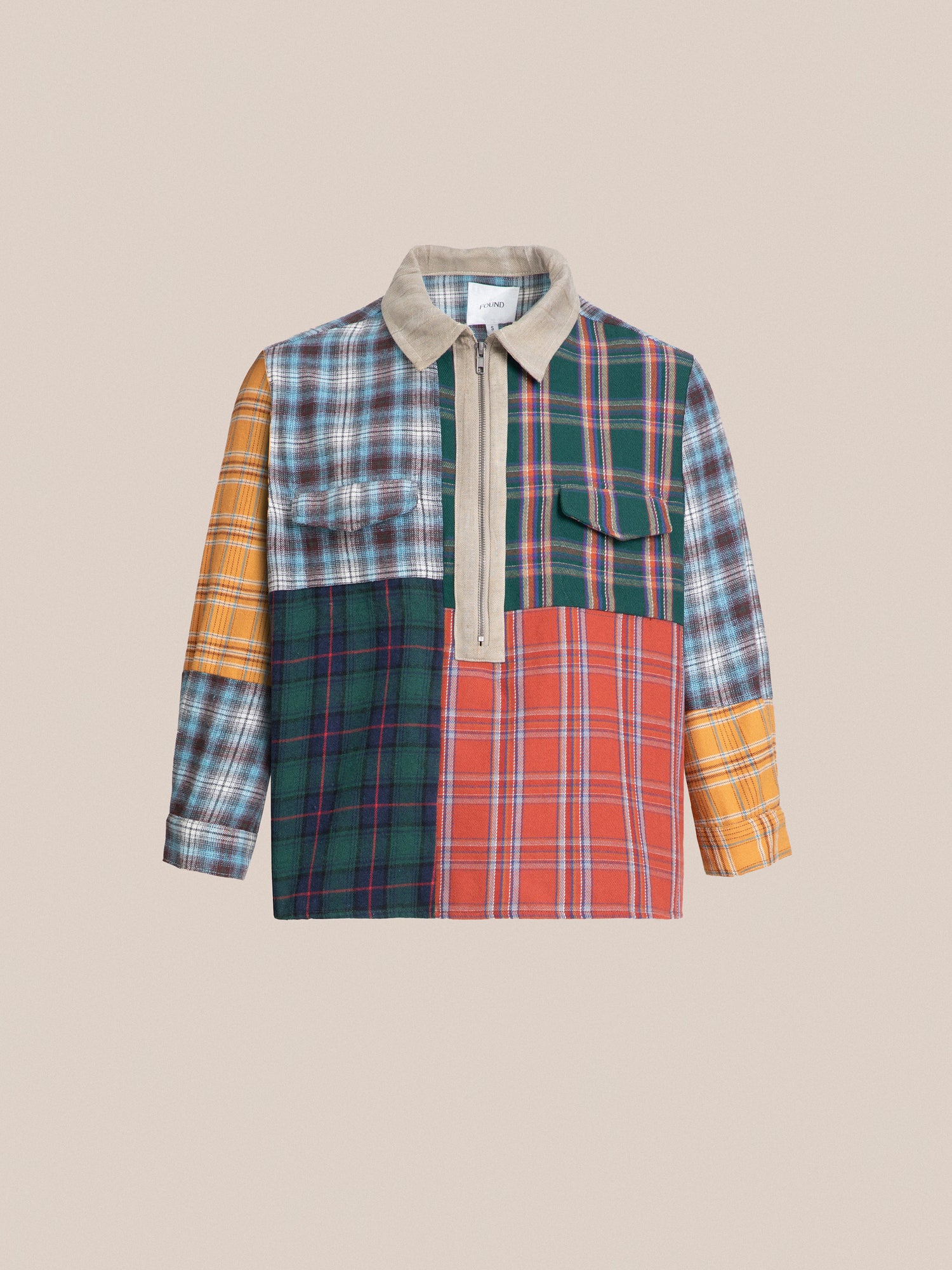 A Multi Plaid Tartan Shirt from Found with a checkered pattern and distressing.