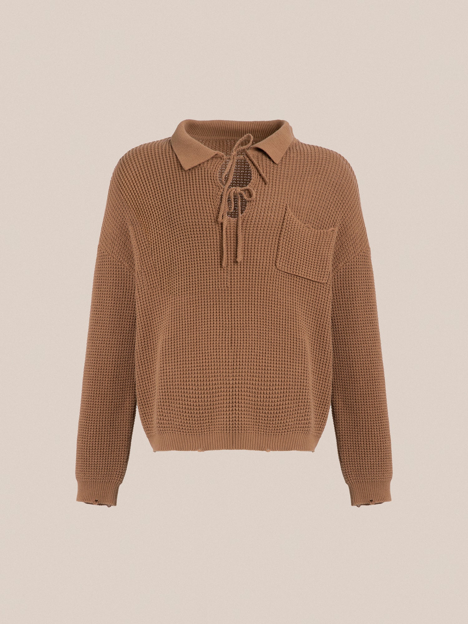 A cozy, brown Found tie-collar knit sweater with a lace-up neckline, perfect for autumn.