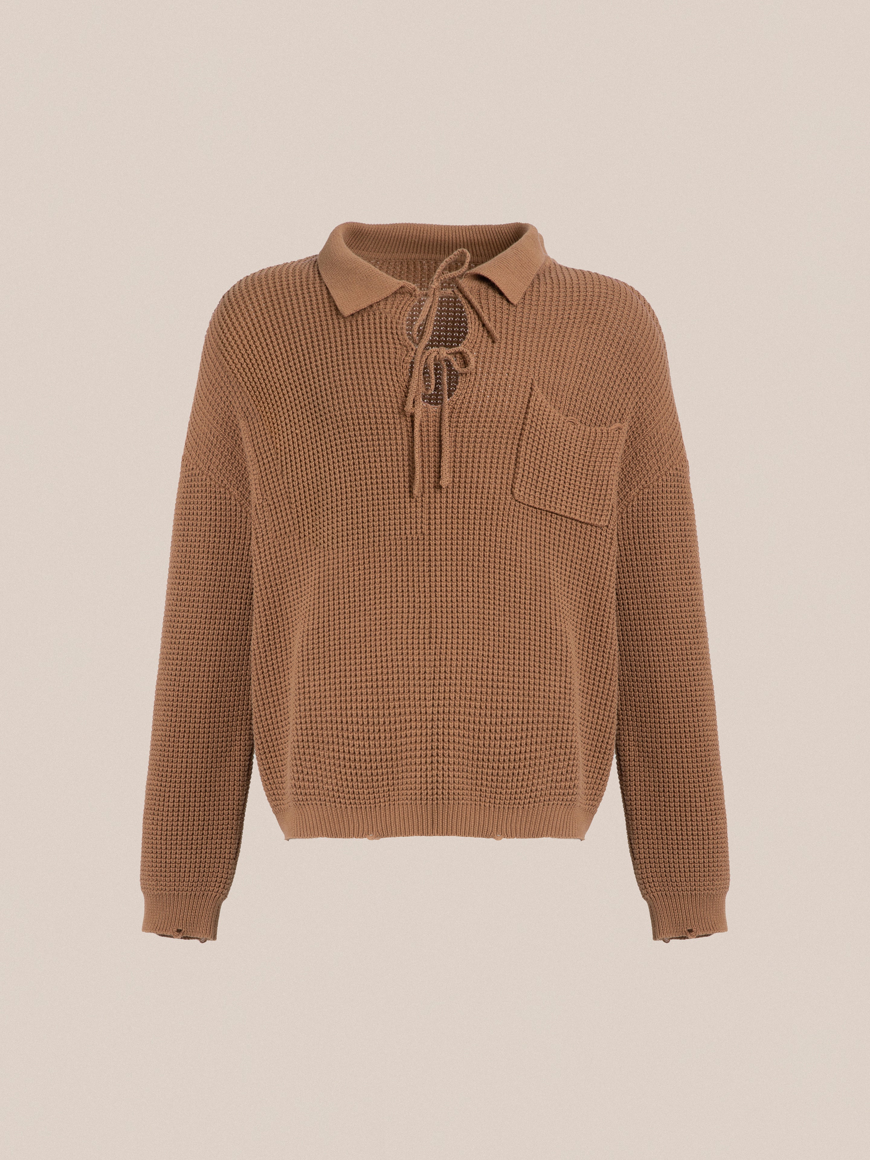 A cozy, brown Found tie-collar knit sweater with a lace-up neckline, perfect for autumn.