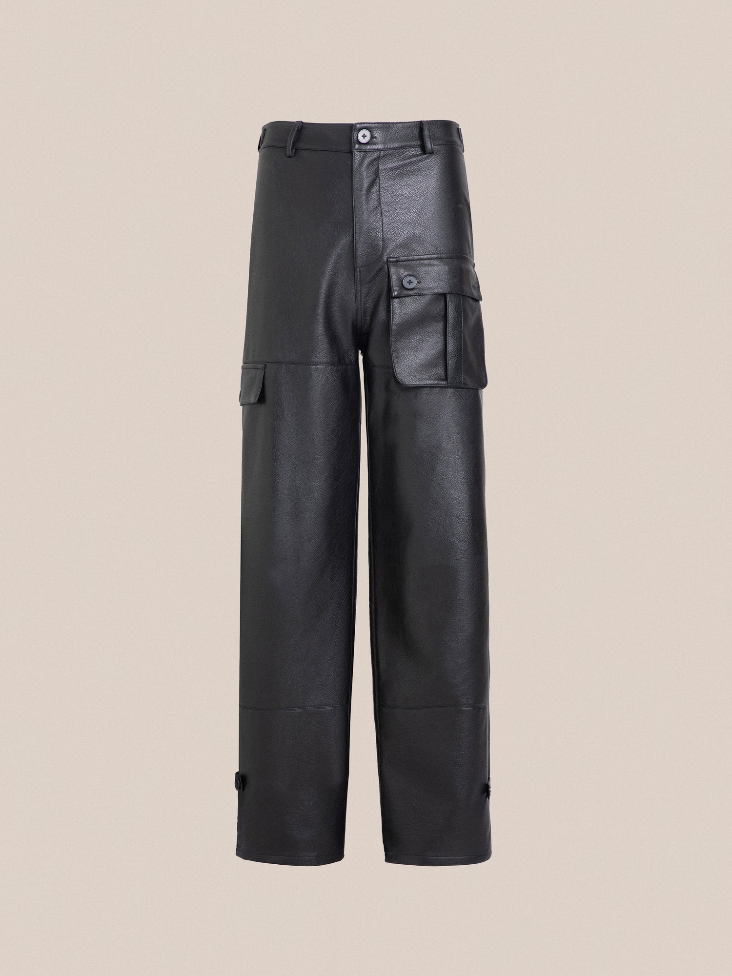 A pair of black Found Faux Leather Cargo Pants with cargo pockets.
