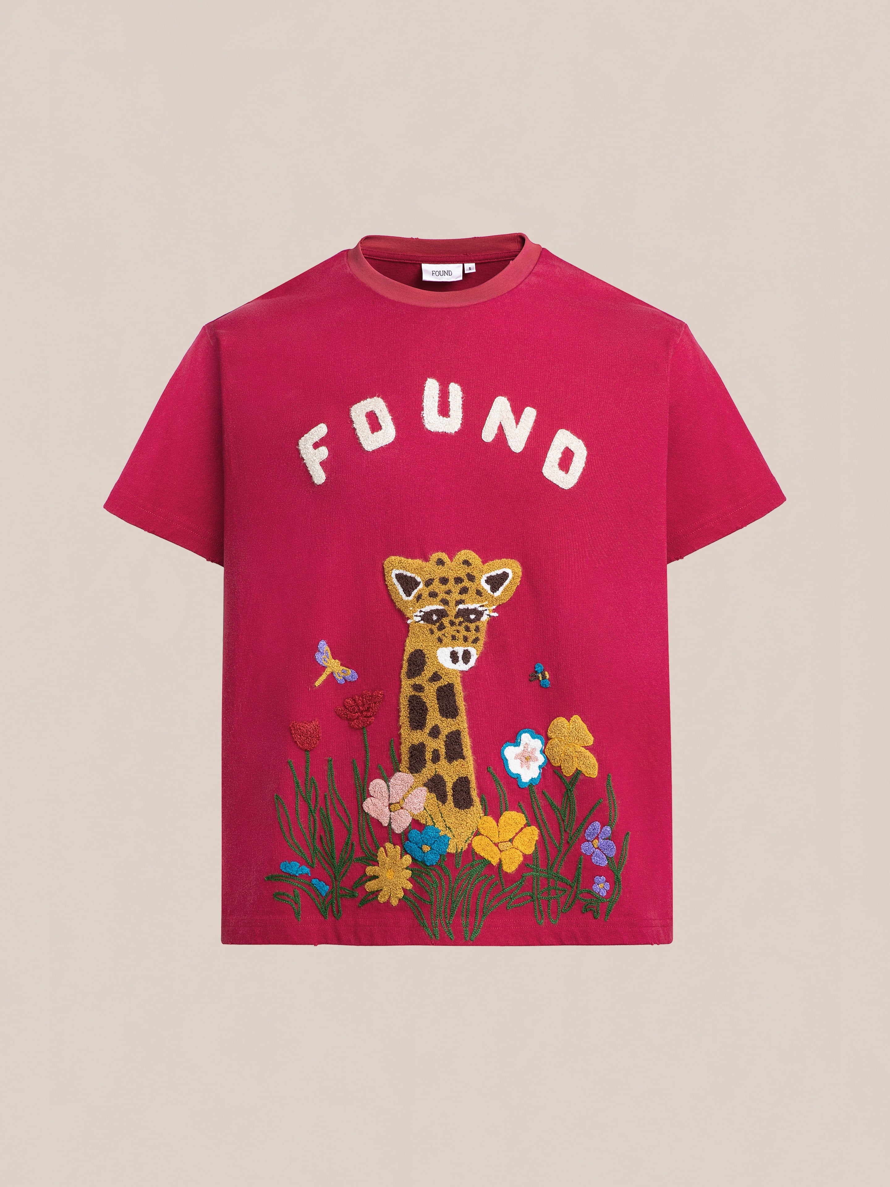 FOUND Embroidered Wildlife Tee with chenille embroidery of a giraffe, flowers, and butterflies on the front.