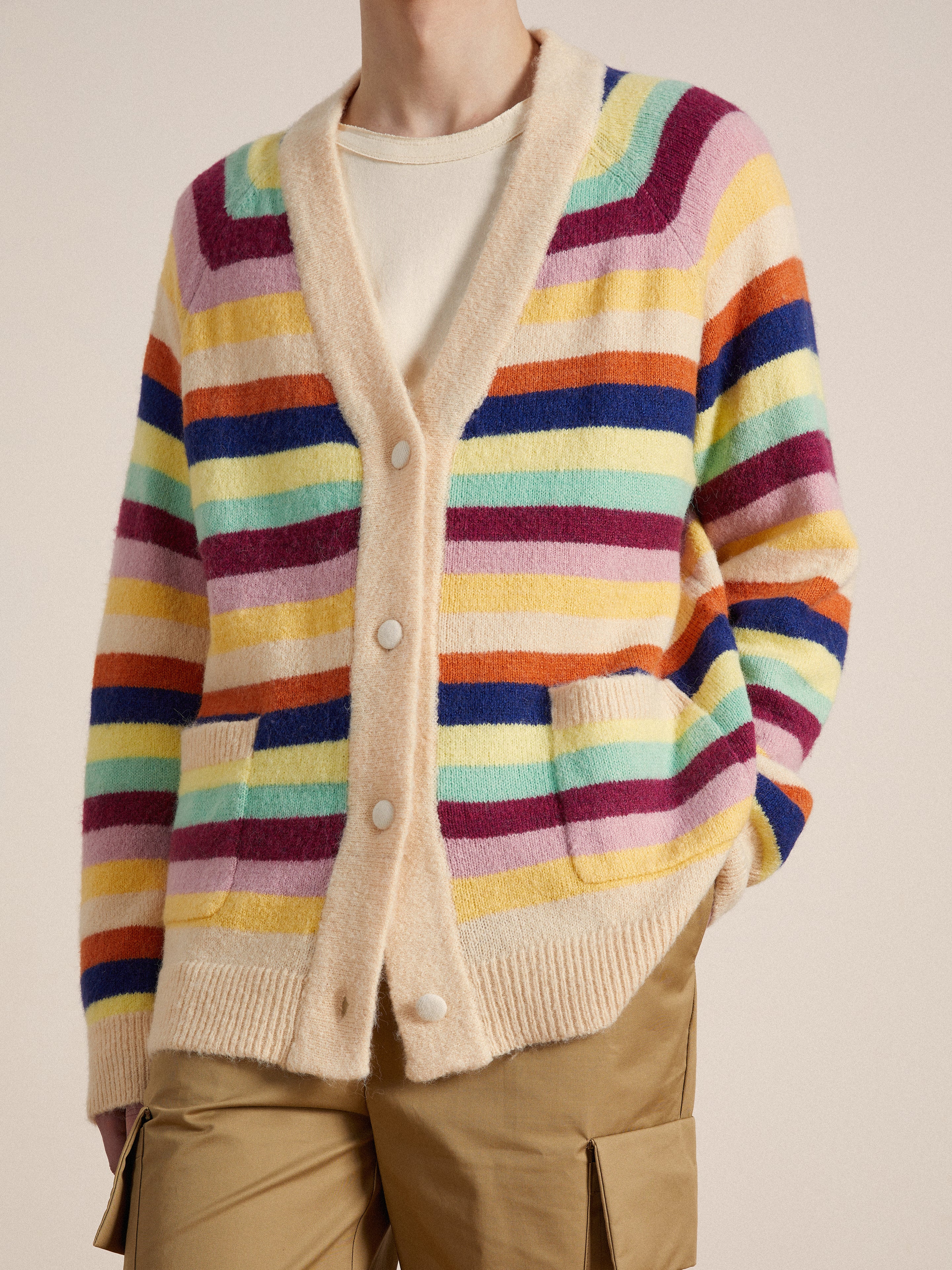 A person wearing a Found Razi Multi Stripe Cardigan.