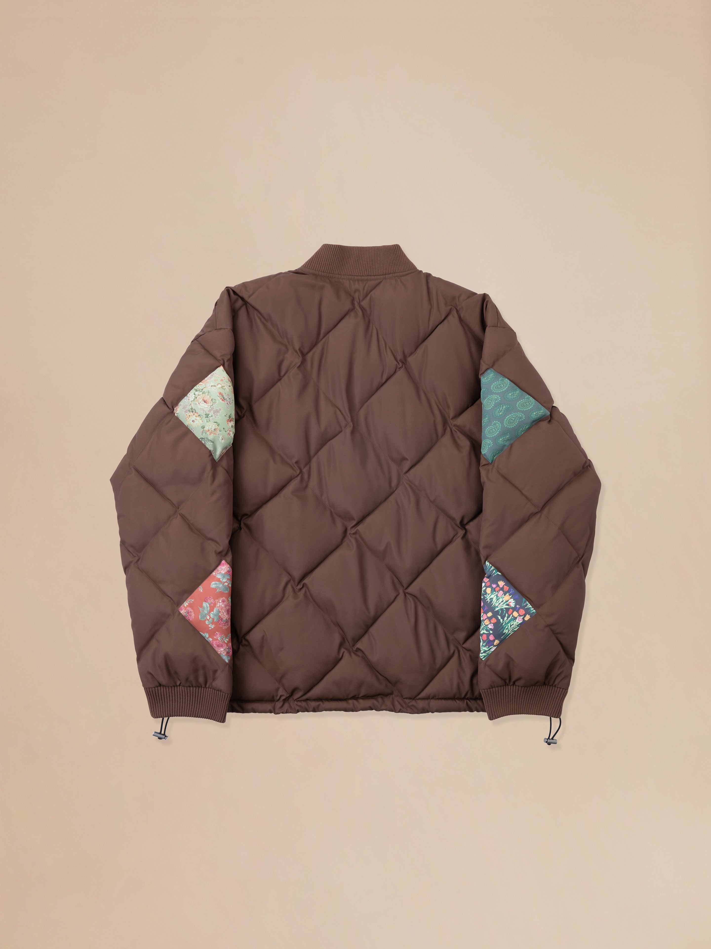 A pre-order Found Diamond Quilt Patchwork Jacket with South Asian prints.