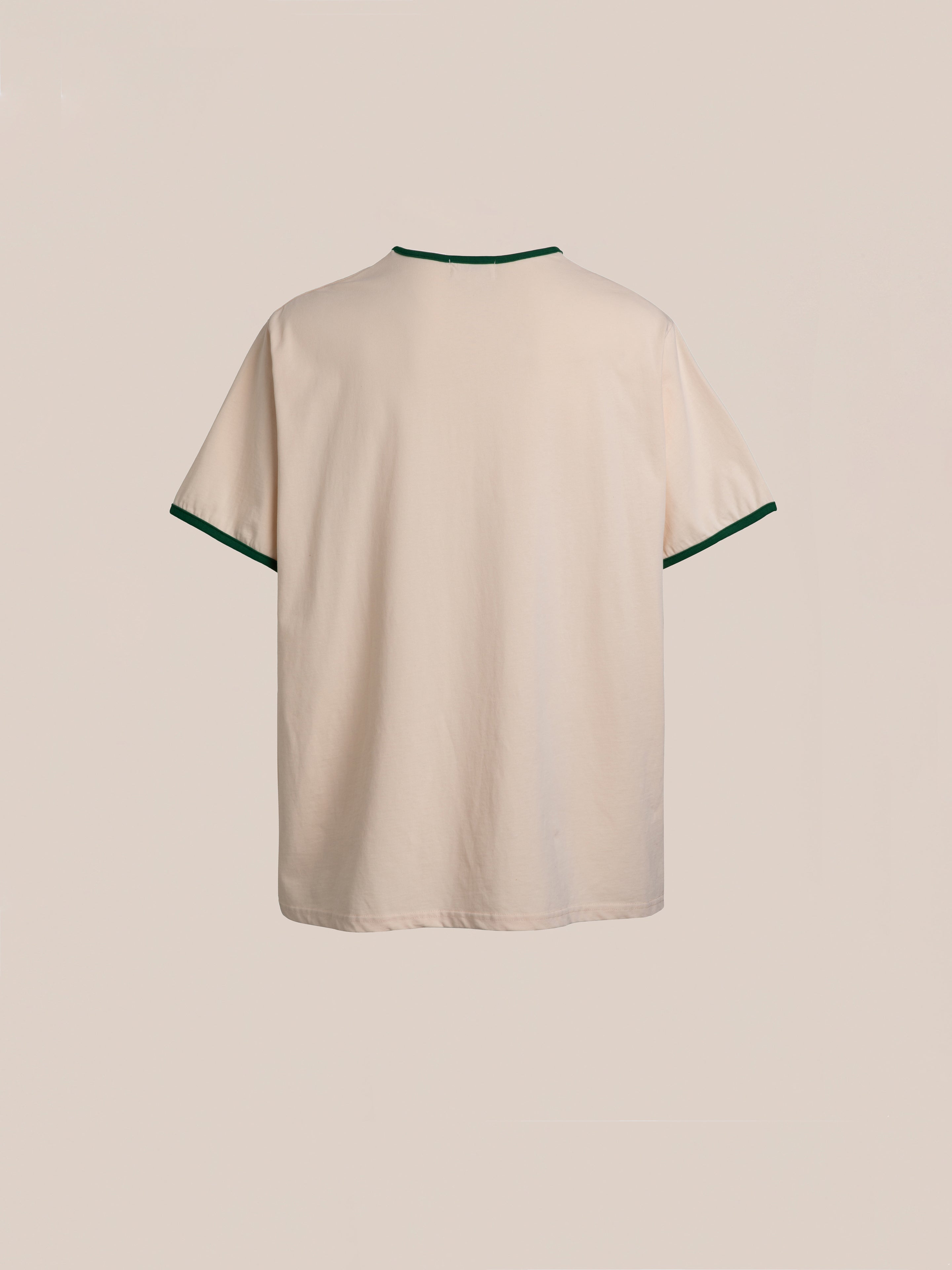 A plain beige Cascade Floral Ringer Tee by FOUND, featuring green trim around the neckline and sleeve cuffs, is displayed against a neutral background, subtly inspired by South Asian motifs.