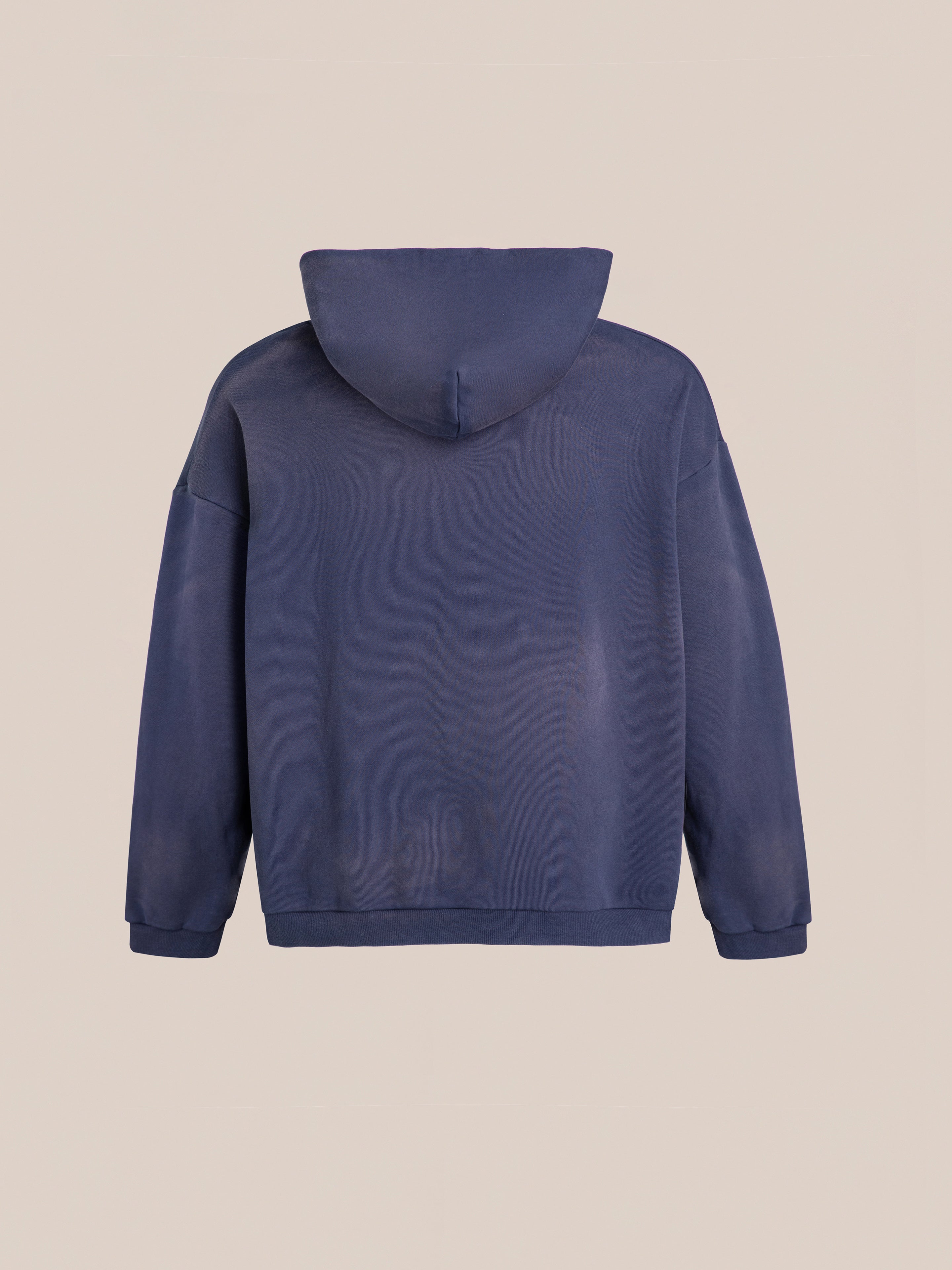 The FOUND Floral Embroidered Deer Hoodie, in navy blue vintage-washed French terry cotton, is displayed from the back against a plain beige background.