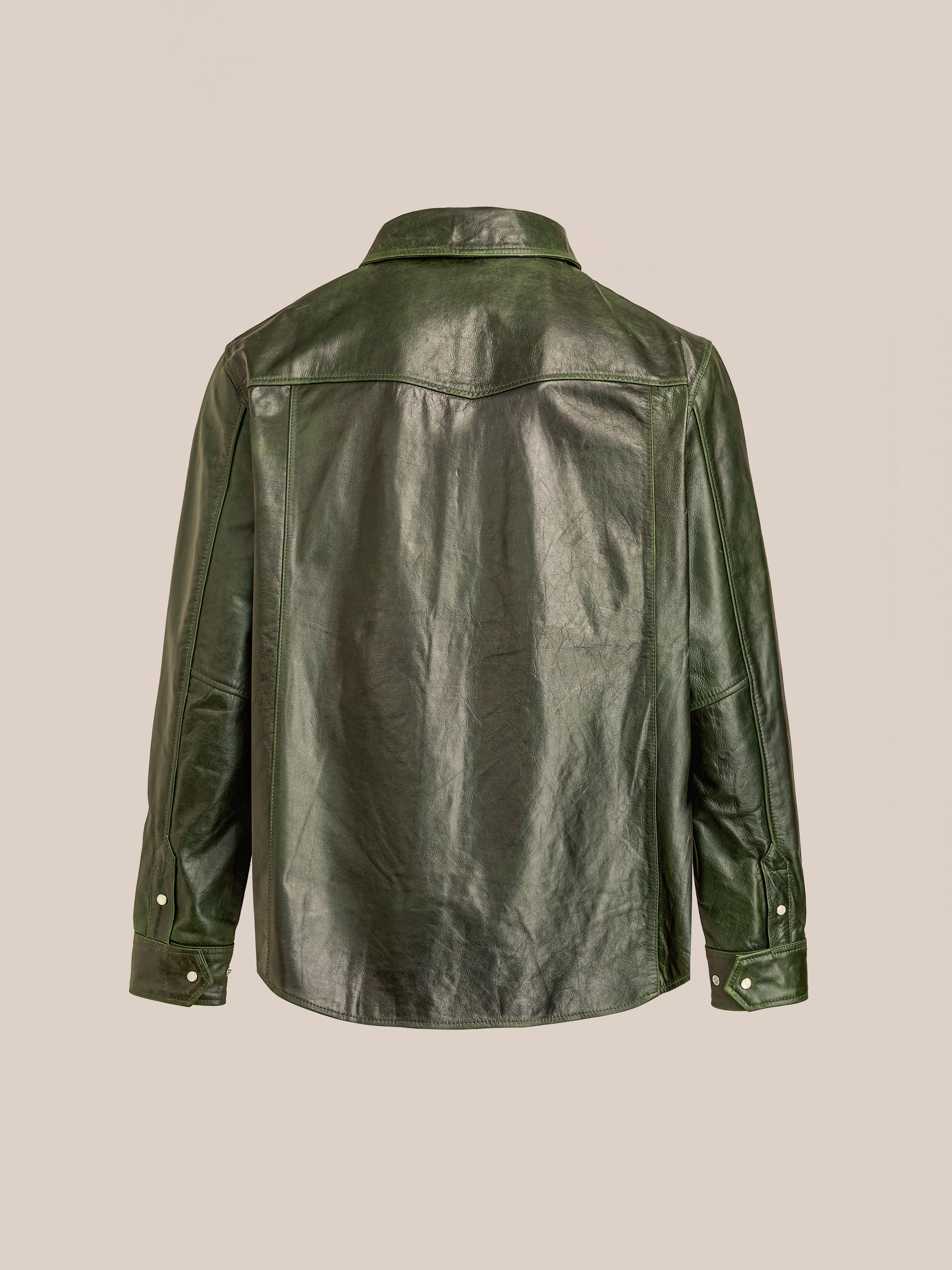 Back view of the FOUND Forest Leather Western Shirt, featuring long sleeves, buttoned cuffs, and a straight hem, shown against a plain beige background.