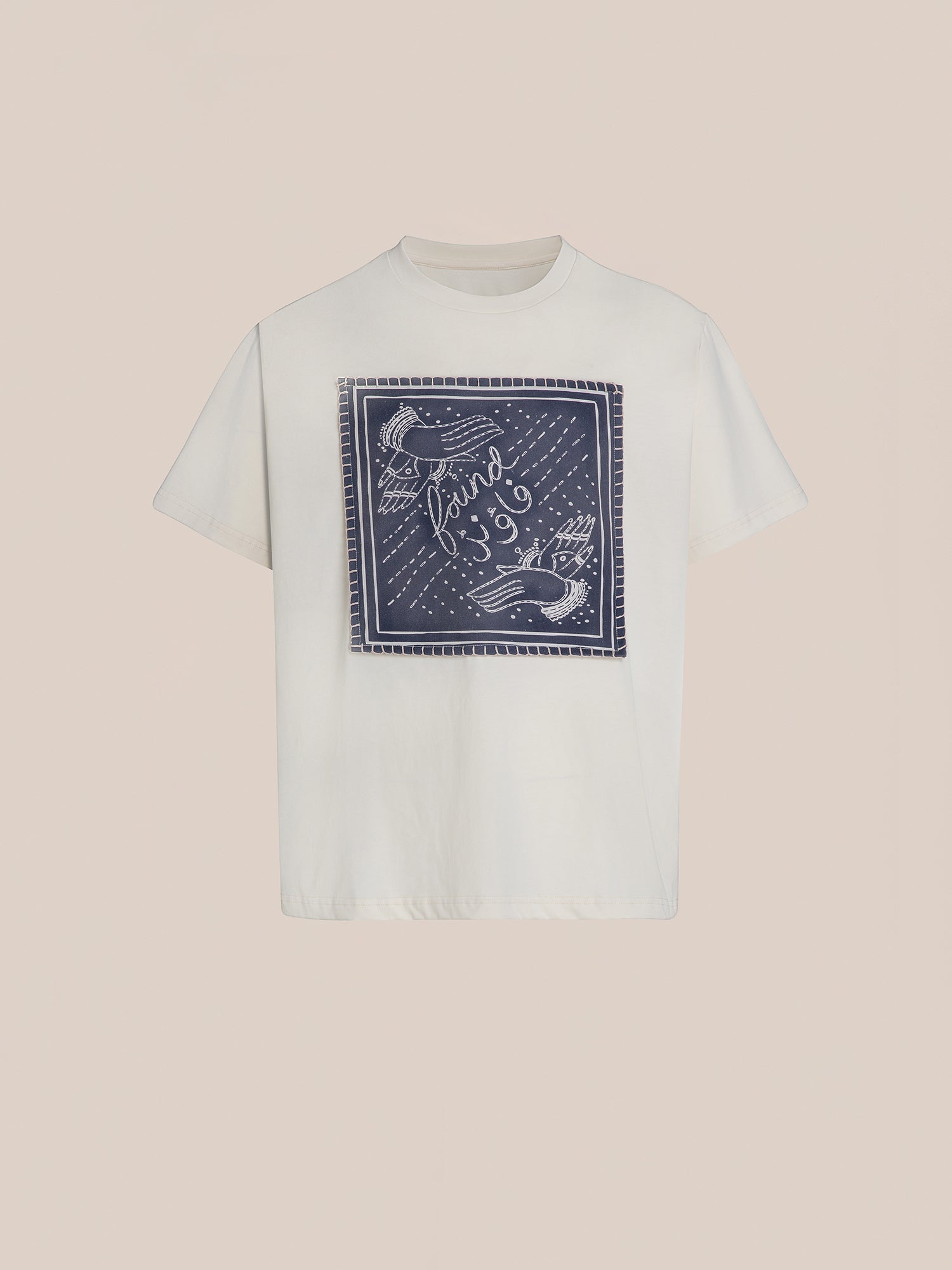 The Urdu Graphic Tee by FOUND is a white T-shirt crafted from 100% cotton, featuring a square design on the front with two birds and "Faire 13.06" in a stitched style. Inspired by South Asian Mughal art, this piece showcases intricate detailing reminiscent of an Urdu graphic aesthetic.